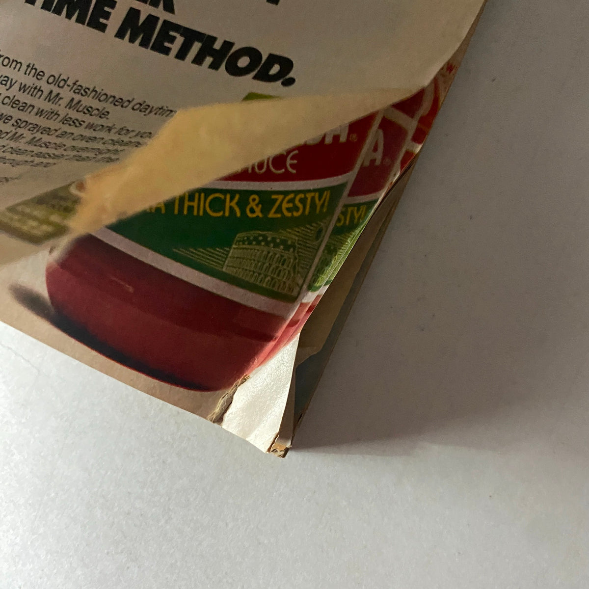 Vintage advertisement featuring ketchup packaging, from the Family Circle Magazine December 1976 edition, showcasing retro product design.