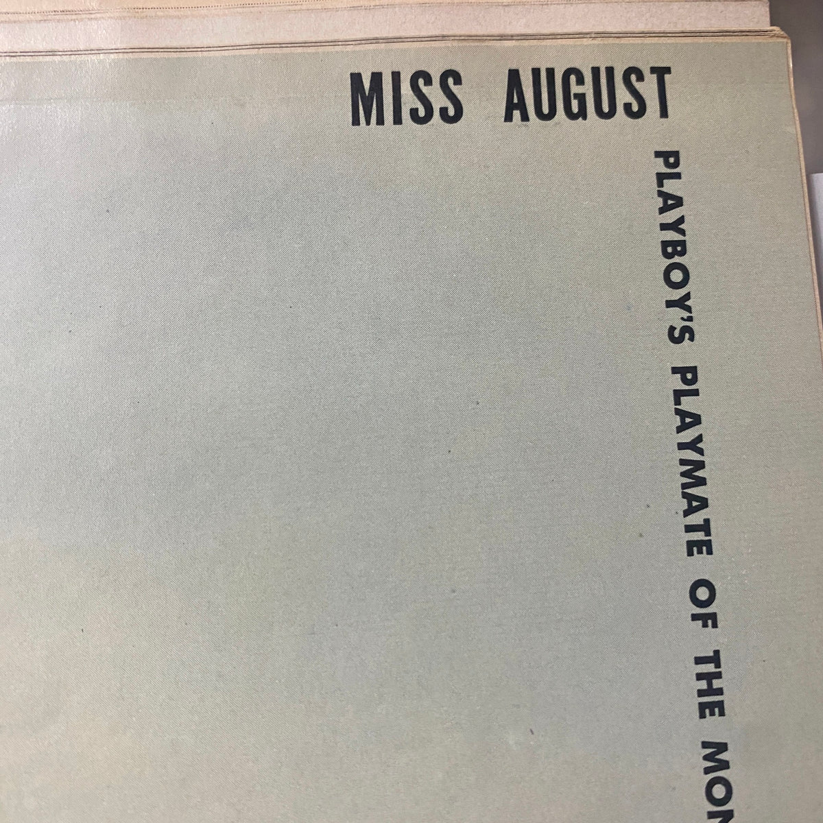 Interior page of Playboy Magazine August 1960 with the title 'MISS AUGUST' indicating the Playmate of the Month.