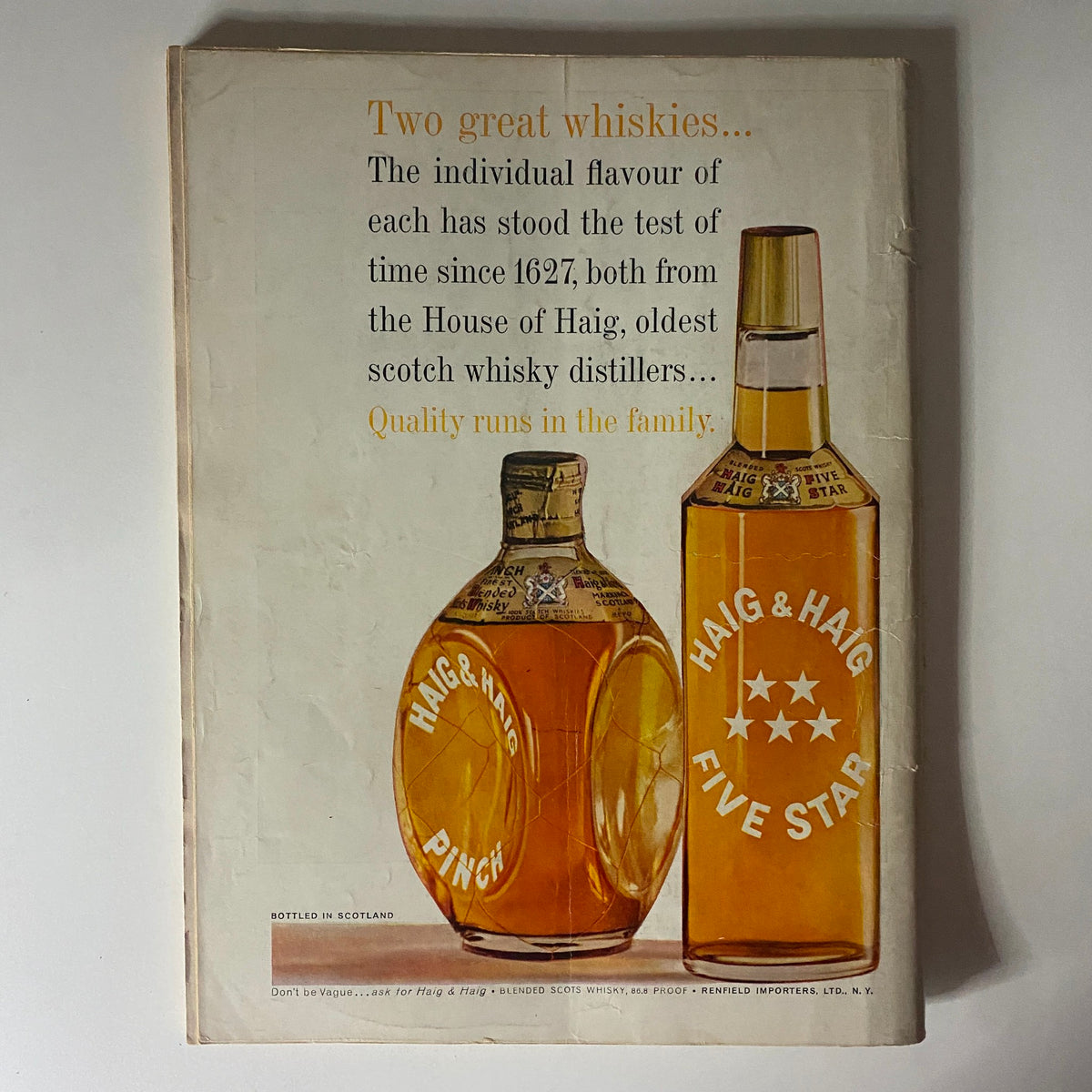 Back cover of Playboy Magazine September 1961 advertising Haig and Haig whisky bottles, showcasing vintage advertisement design.