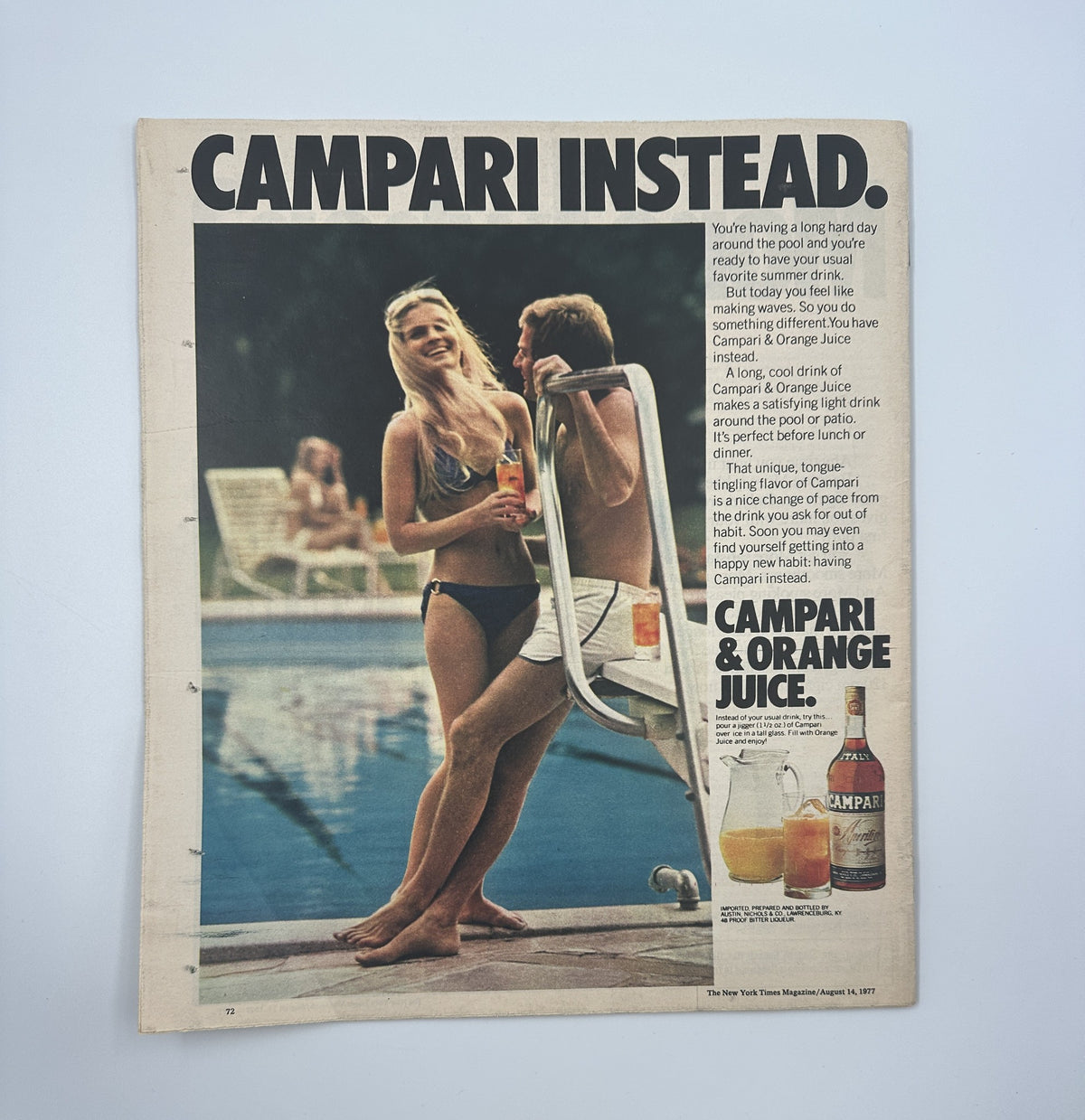 The New York Times Magazine August 14, 1977 featuring a retro advertisement for Campari, displaying a woman in a bikini and a man by a swimming pool, with the text 'Campari Instead' promoting the drink.