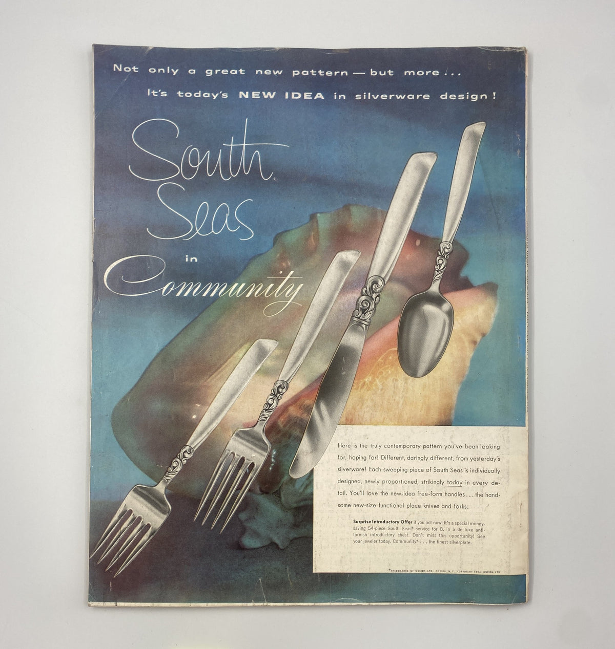 Back cover of Woman’s Home Companion Magazine September 1954 featuring a promotional design for South Seas silverware, showcasing modern elegance in silverware design.
