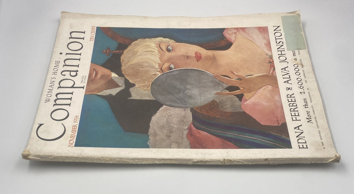Alternative angle of the November 1934 edition of Woman’s Home Companion Magazine, showcasing the artistic cover by Edna Ferber and Alva Johnston, with a focus on the woman and her mirror.