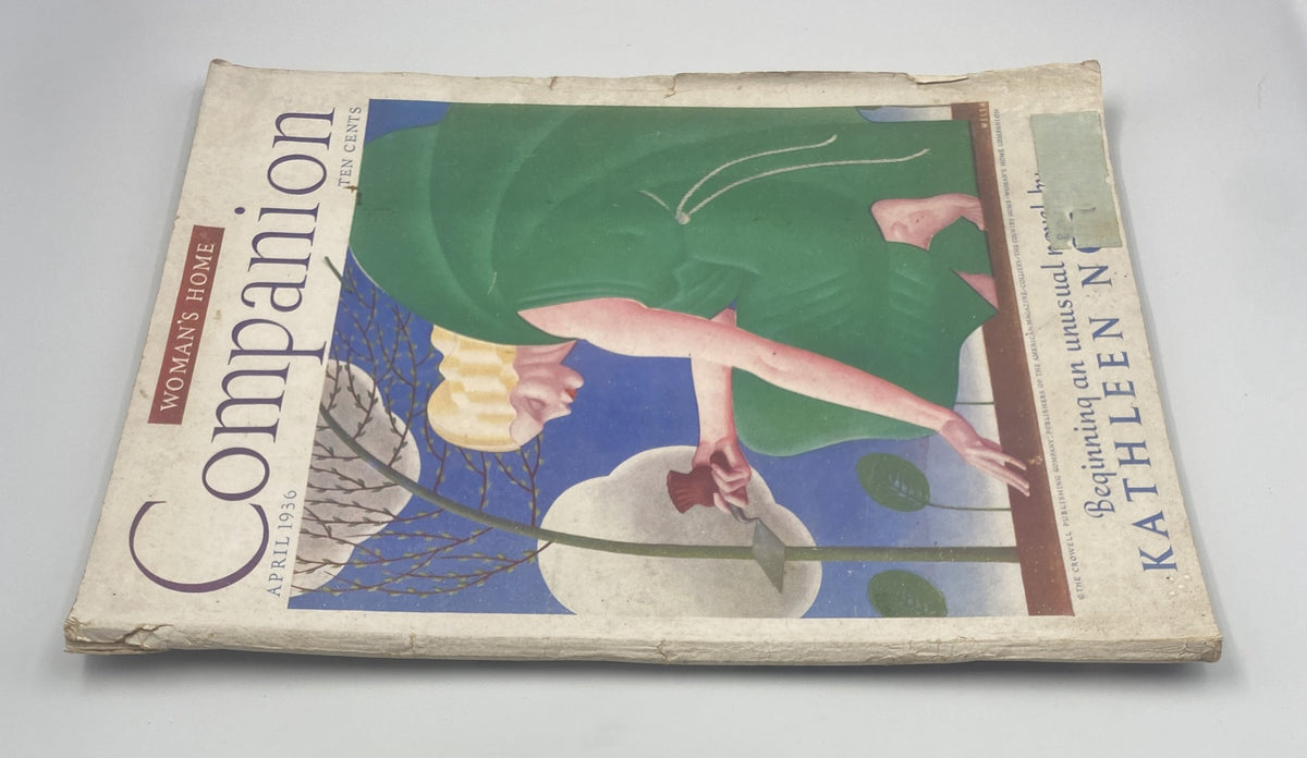 Side view of the Woman’s Home Companion Magazine from April 1936, showing the front cover with artwork depicting a woman among flowers, related to a serial by Kathleen Norris.
