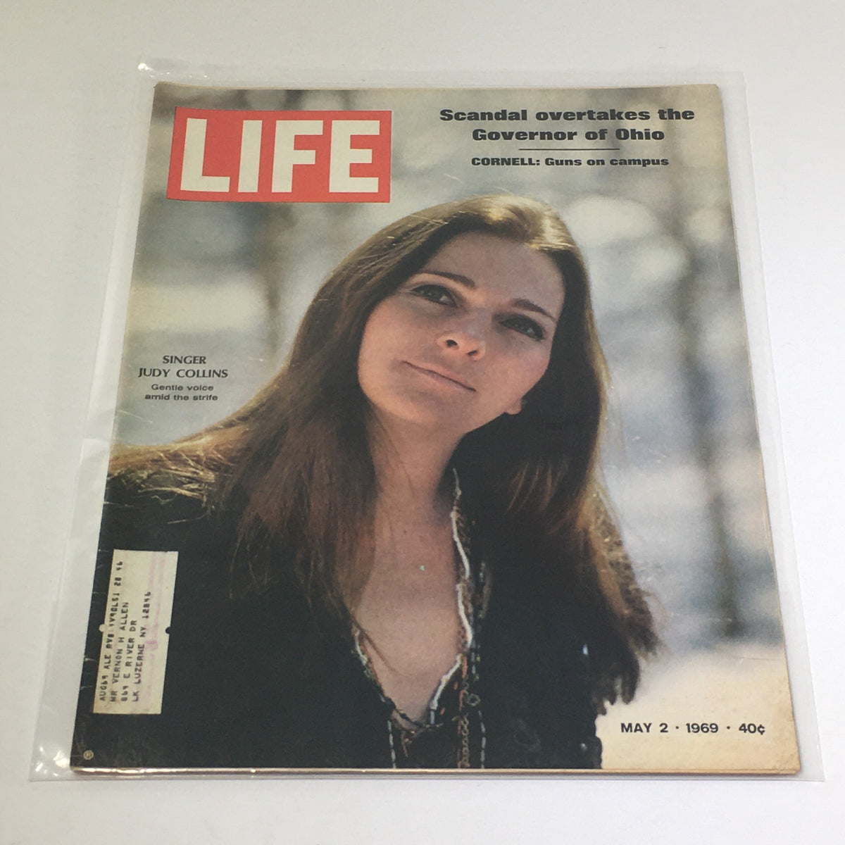 Cover of VTG Life Magazine dated May 2, 1969 featuring singer Judy Collins, with the headline 'Guns on Campus' and additional text discussing social issues of that era.