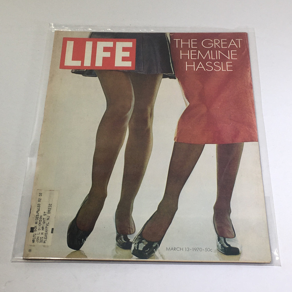Cover of VTG Life Magazine from March 13, 1970 featuring the title 'The Great Hemline Hassle' with a focus on fashion and hemlines of the 1970s, showcasing two women in stylish skirts and heels.