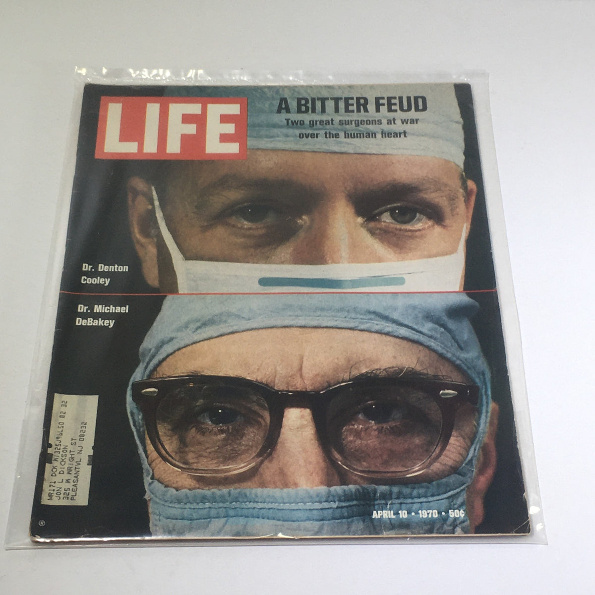 Life Magazine cover from April 10, 1970, featuring Dr. Denton Cooley and Dr. Michael DeBakey, highlighting their significant contributions to heart surgery with the headline 'A Bitter Feud.' This vintage magazine is a collectible piece depicting a pivotal period in medical history.