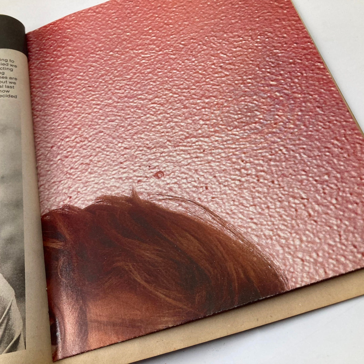 Inside page showing a pink textured background from the VTG Teen Favorites Magazine February 1978 featuring John Travolta.