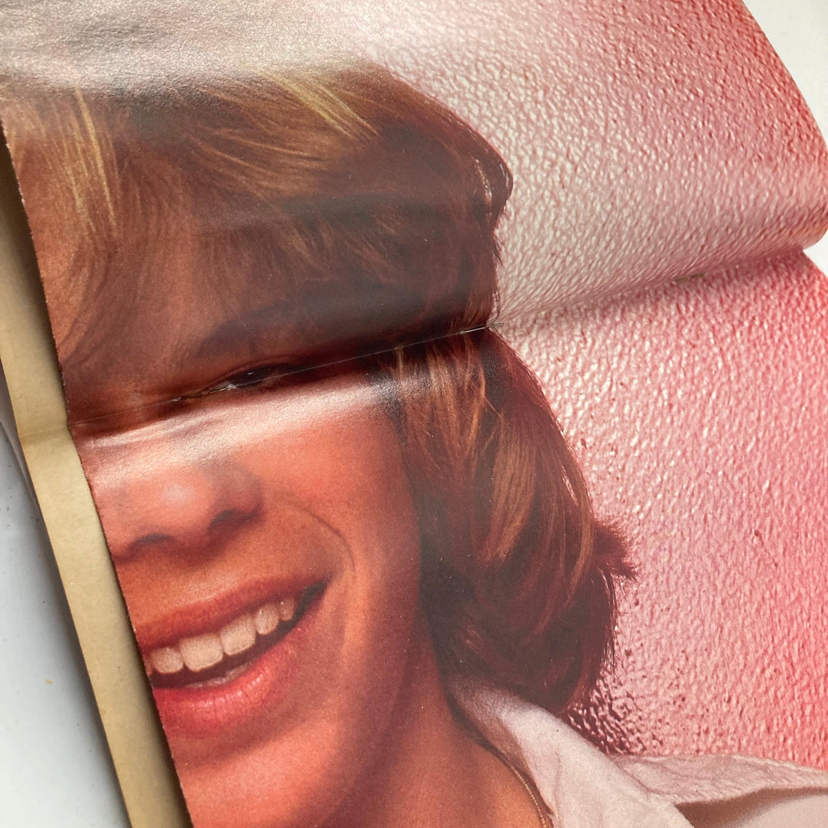 Inside page with a close-up image of a smiling person from the VTG Teen Favorites Magazine February 1978 featuring John Travolta.