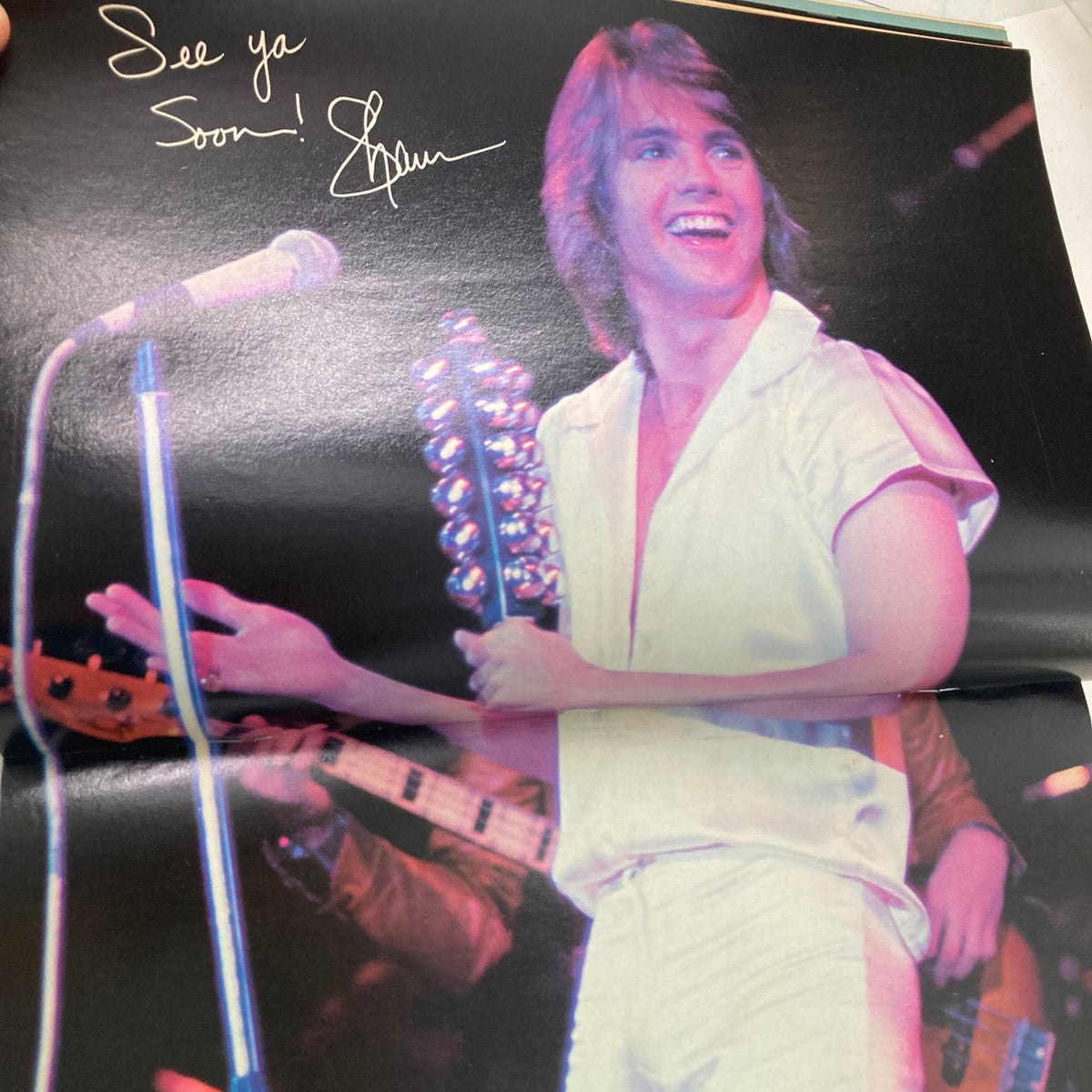 Shaun Cassidy performing on stage in a white outfit, smiling and holding a tambourine, with the text 'See ya Soon!' handwritten, from the Tiger Beat Star Magazine April 1978.