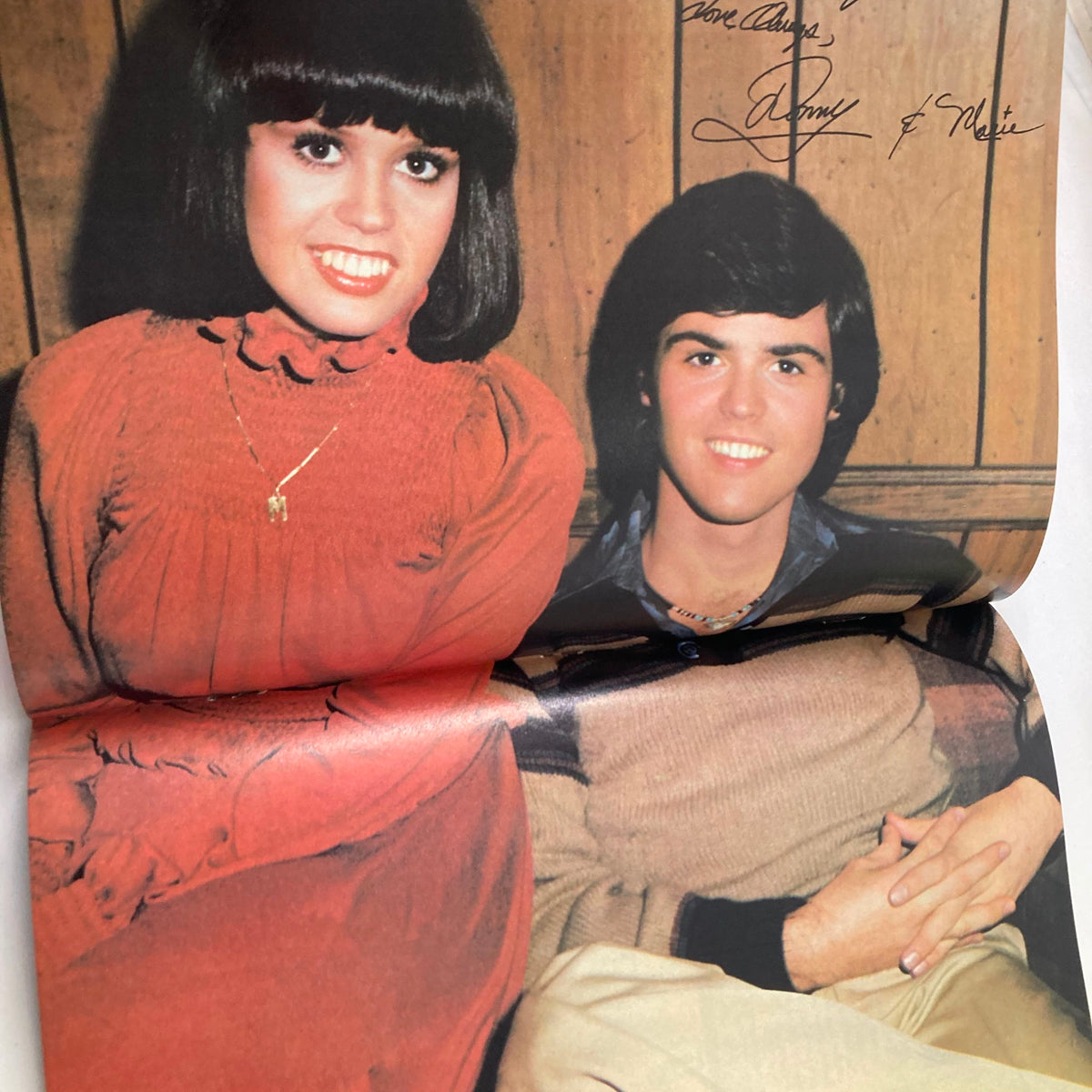 Poster image from VTG Tiger Beat Magazine Presents 1977 Vol 1 #2 featuring a candid shot of Donny and Marie Osmond, displaying their iconic style and personalities from the 1970s.