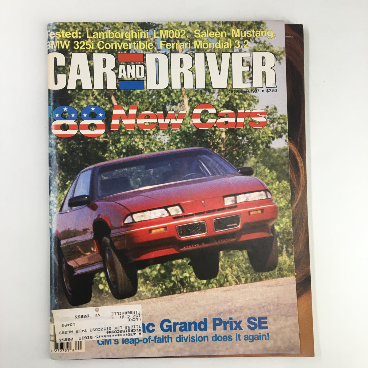 Cover of Car and Driver Magazine, October 1987 featuring the 1988 Pontiac Grand Prix SE, showcasing new cars with a vibrant image of a red Pontiac Grand Prix SE in motion.
