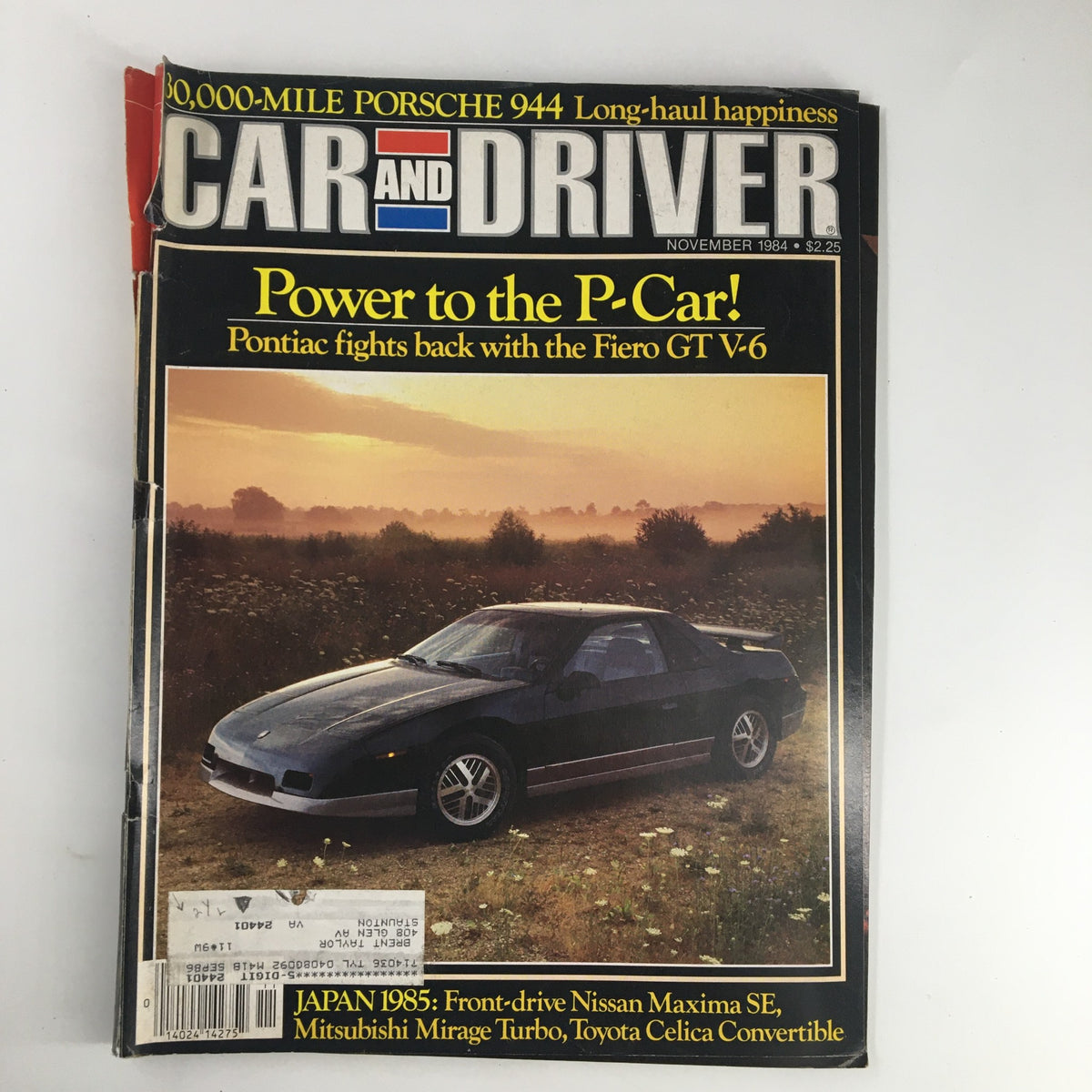 Cover of Car and Driver Magazine November 1984 featuring Pontiac Fiero GT V-6, with headline 'Power to the P-Car!' showcasing the vehicle in a scenic background.