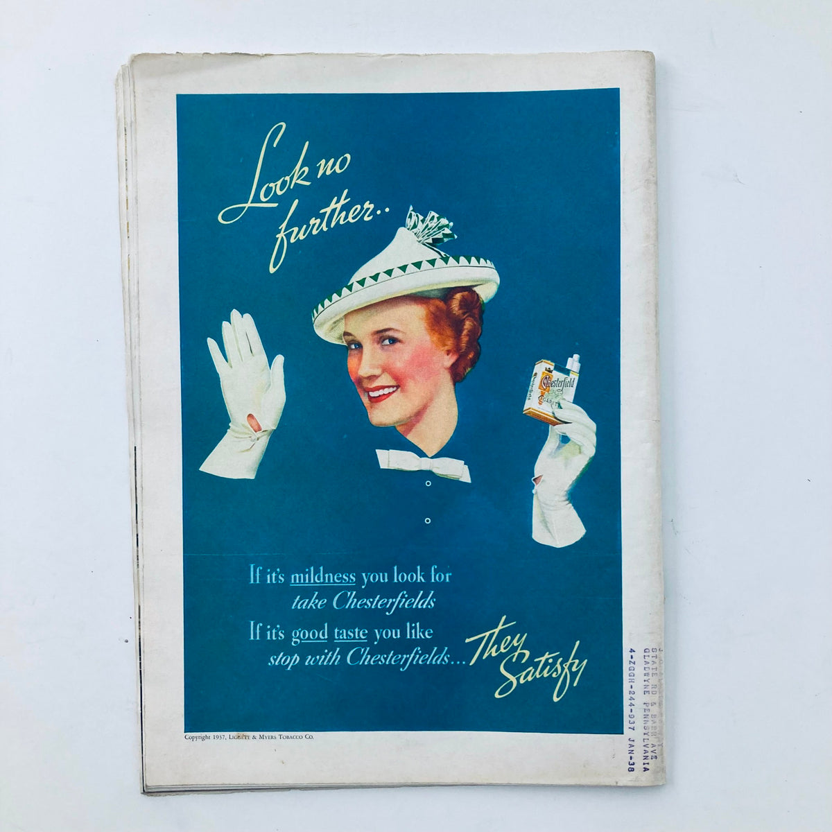 Vintage advertisement featuring a smiling woman in a white hat and gloves promoting Chesterfield cigarettes, published in the VTG Time Magazine July 26 1937, Vol 30 No. 4.