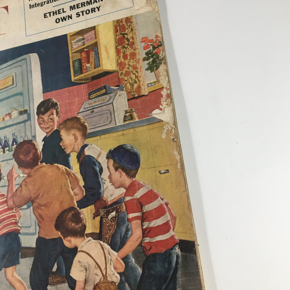 Front cover of The Saturday Evening Post February 19 1955 showing boys gathered around a refrigerator, one boy smiling.