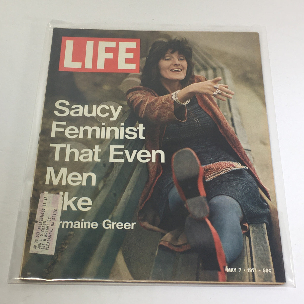 Vintage Life Magazine cover from May 7, 1971 featuring Germaine Greer, titled 'Saucy Feminist That Even Men Like', showcasing a candid image of Greer smiling while sitting outdoors.