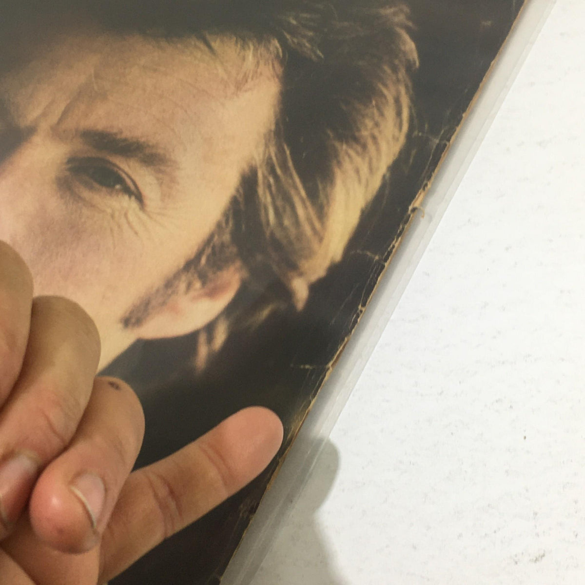 Close-up of Clint Eastwood's portrait on the cover of Life Magazine, from the July 23, 1971 issue, showcasing signs of wear typical for vintage publications.