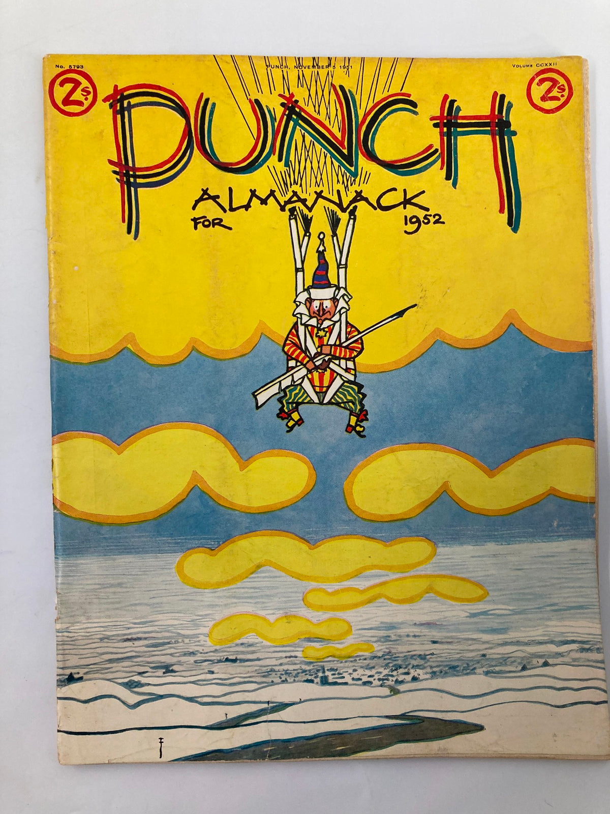 Cover of VTG Punch Magazine from November 5, 1951 featuring colorful artwork with a whimsical design of a clown and clouds, representing post-WWII humor.