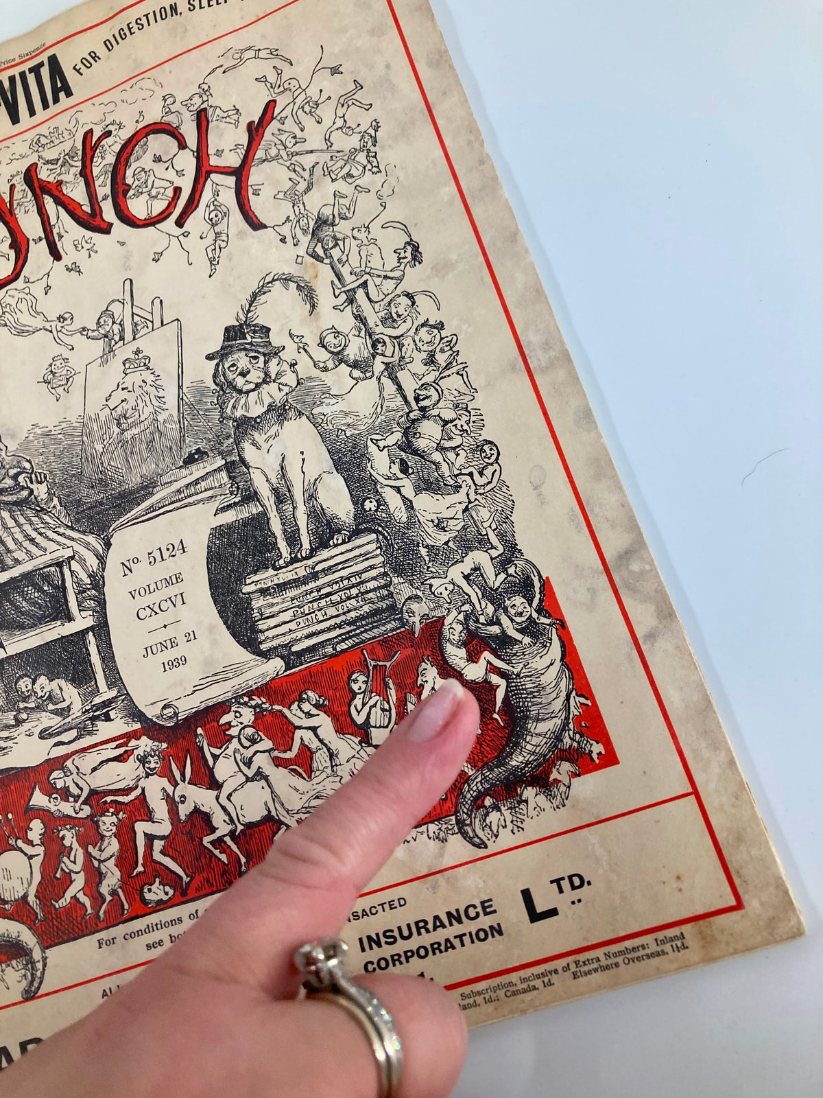 Detailed view of the VTG Punch Magazine June 21 1939 #5124 Vol 196 cover, highlighting intricate illustrations and the magazine's playful theme.