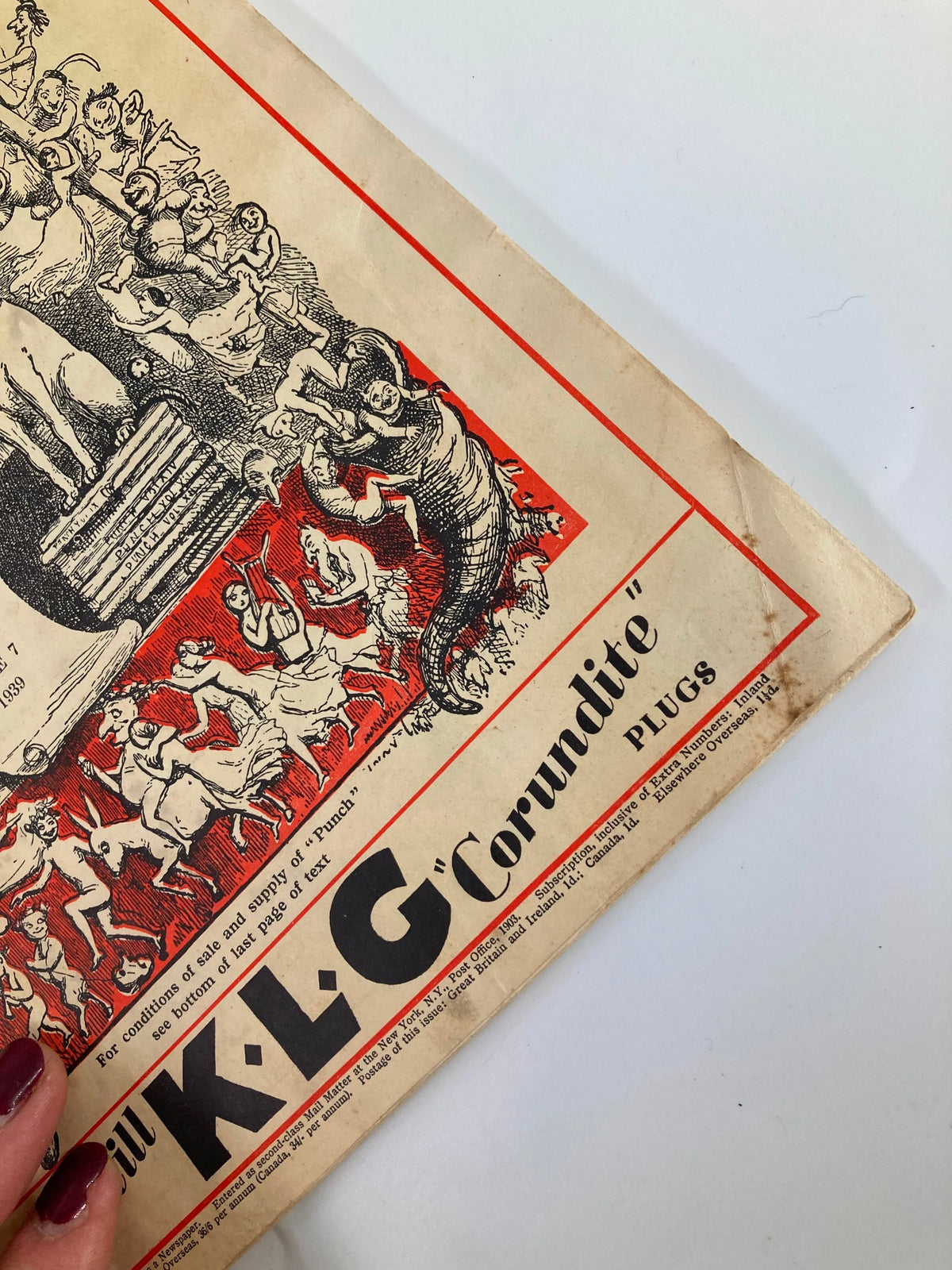 Side view of the VTG Punch Magazine June 7 1939 #5122 showing details of the cover art and the magazine's advertising slogan, with vintage graphics.