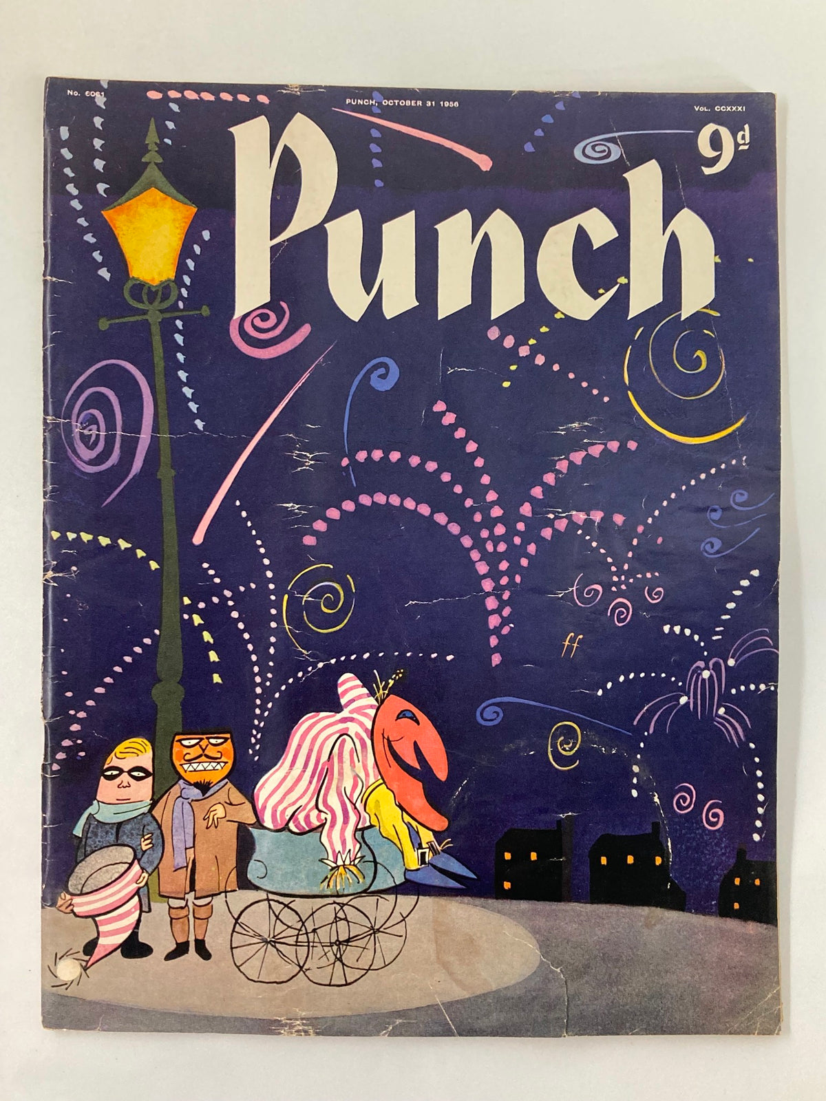 Cover of VTG Punch Magazine, October 31, 1956, showcasing vibrant cartoon art with characters under a street lamp and fireworks in a night sky.