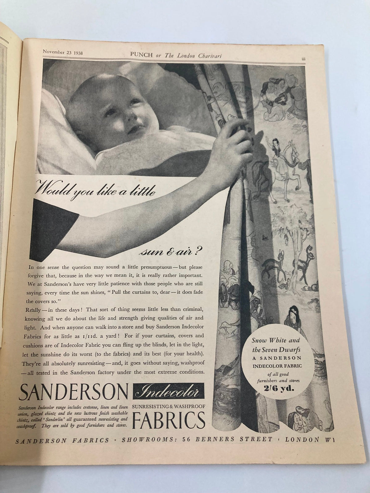 Interior page of VTG Punch Magazine November 23 1938 displaying an advertisement for Sanderson Indecolor Fabrics featuring a child and decorative patterns.