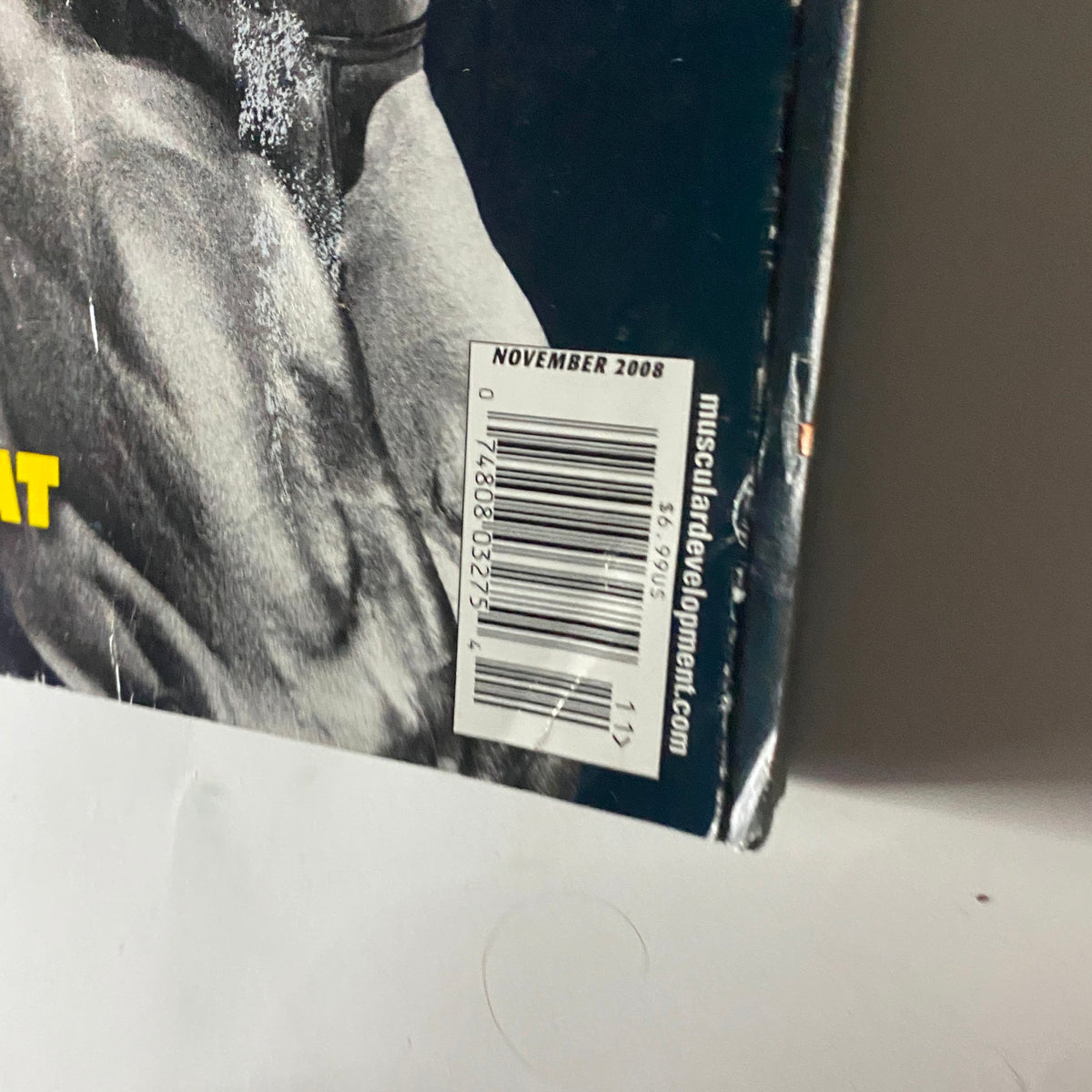 Side view of Muscular Development Magazine November 2008 displaying the publication date and barcode, emphasizing its vintage nature.