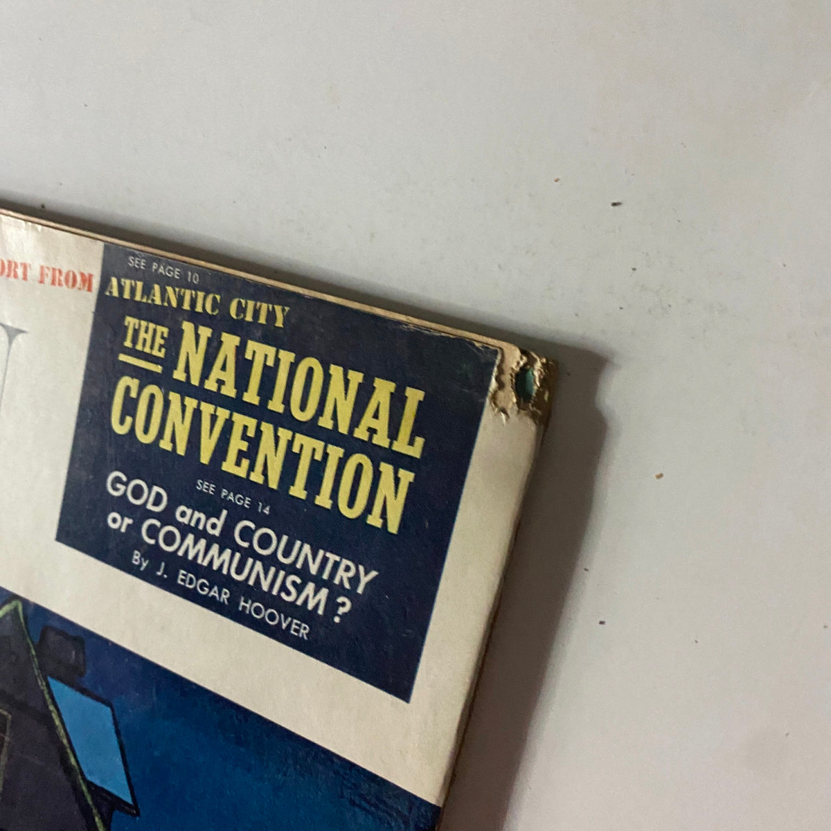 Close-up of The American Legion Magazine November 1957 featuring the heading for the National Convention and the article by J. Edgar Hoover, exploring themes of communism and American values.
