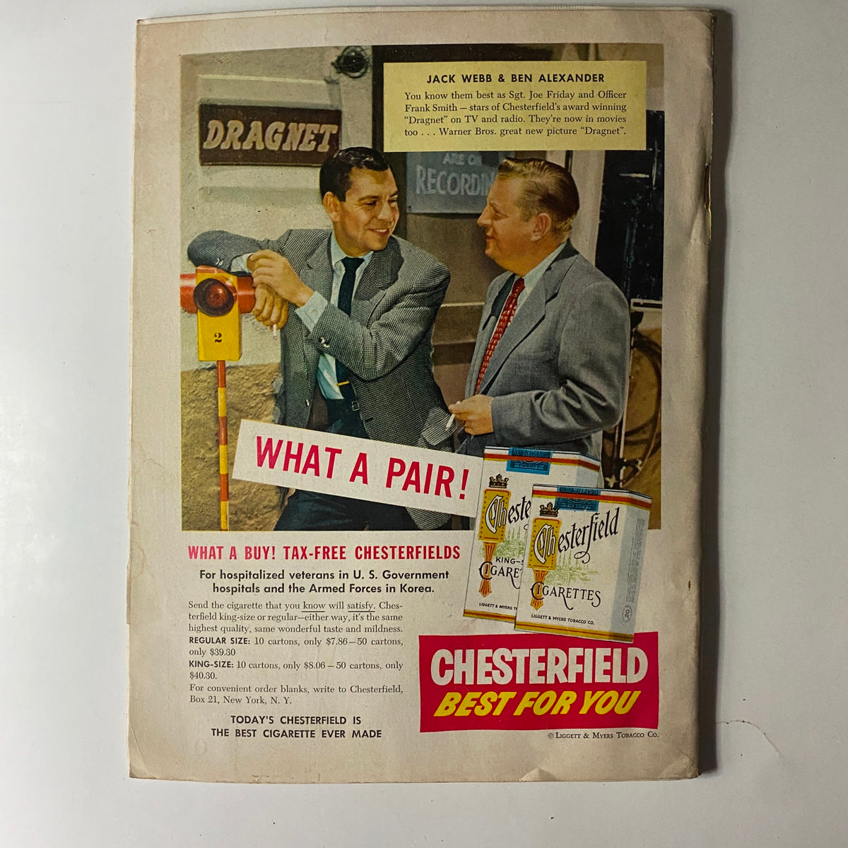 Advertisement page in The American Legion Magazine, November 1954, promoting Chesterfield cigarettes with images of actors Jack Webb and Ben Alexander.