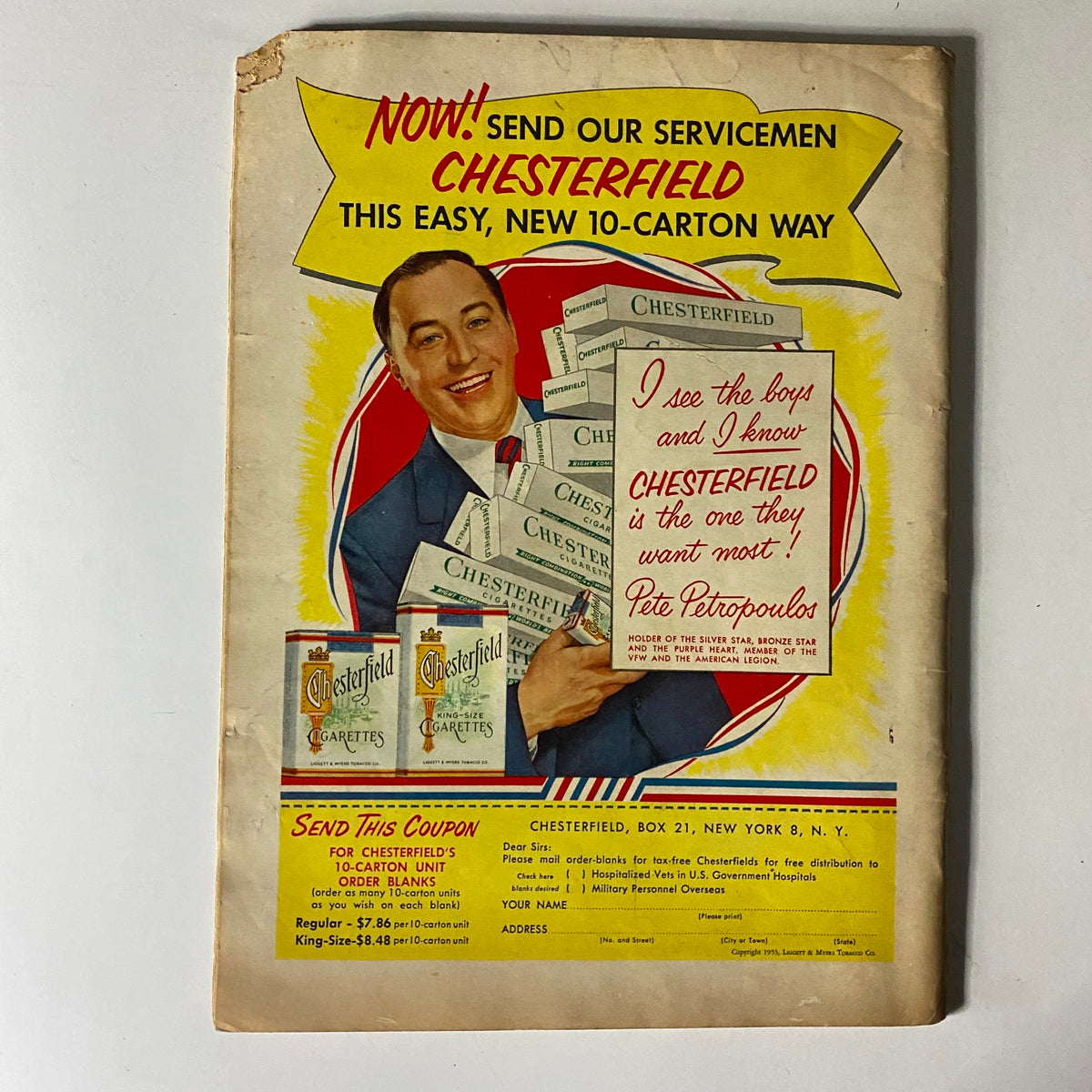 Back cover of The American Legion Magazine July 1953, showcasing an advertisement for Chesterfield cigarettes with a smiling model and bold text.