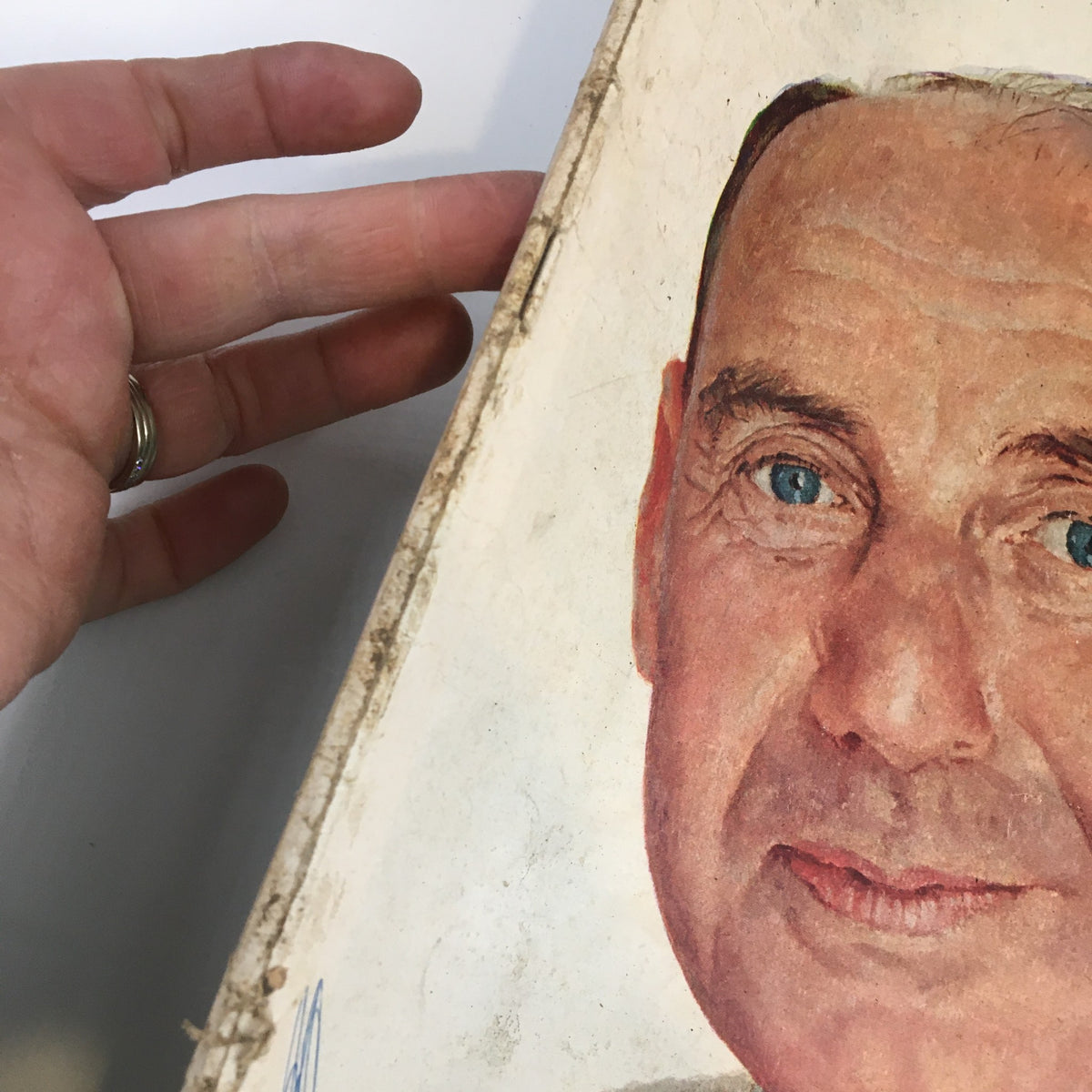 Close-up view of The Saturday Evening Post, October 6, 1956 cover, highlighting the portrait of a man with blue eyes, reflecting the vintage appeal of the magazine.