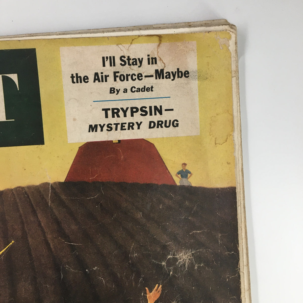 Detail of the cover from The Saturday Evening Post, dated May 28, 1955, showcasing the title 'I'll Stay in the Air Force—Maybe' and an advertisement for 'Trypsin – Mystery Drug'.