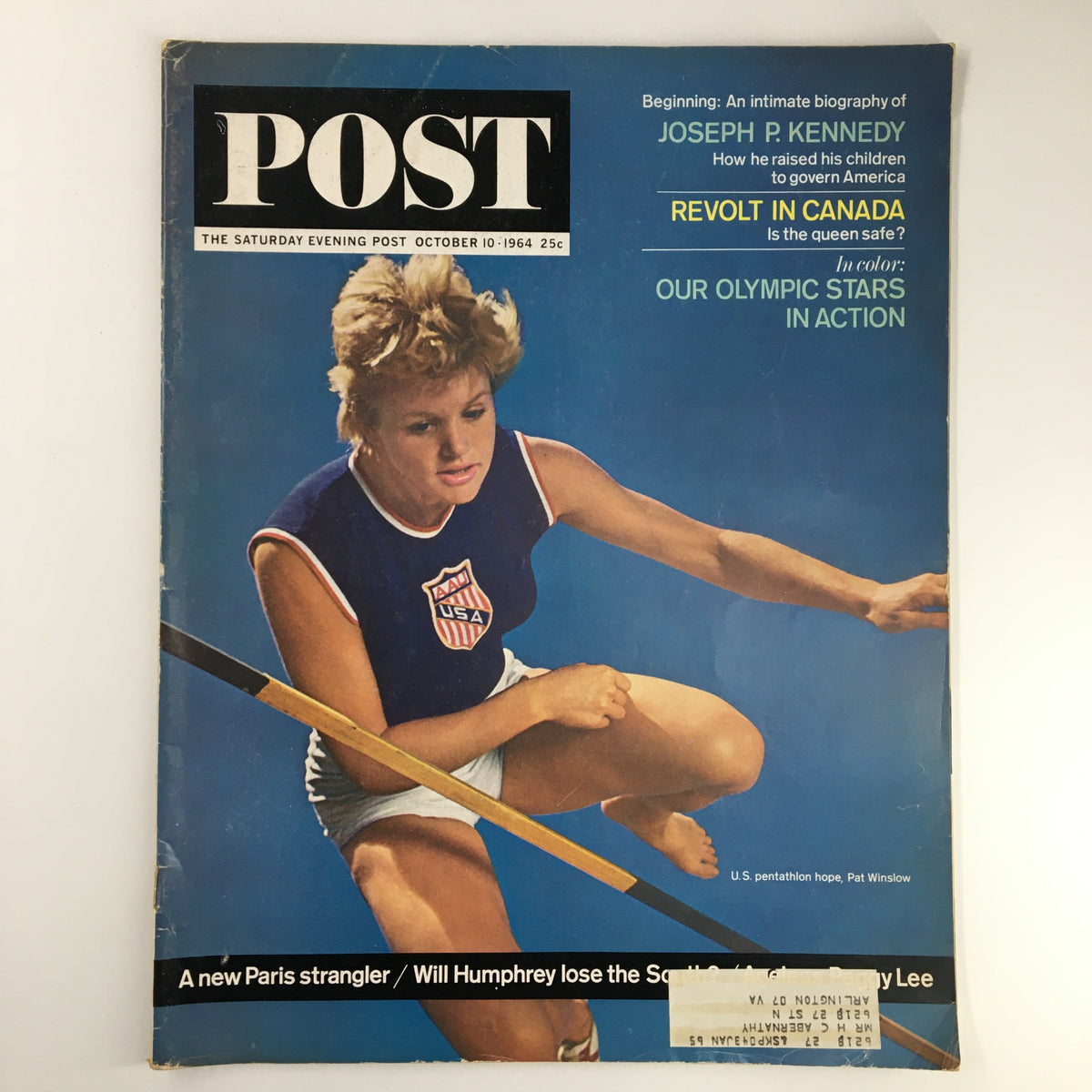 The Saturday Evening Post cover from October 10, 1964, featuring U.S. Pentathlon Hope Pat Wilson in action, showcasing vintage sports memorabilia.