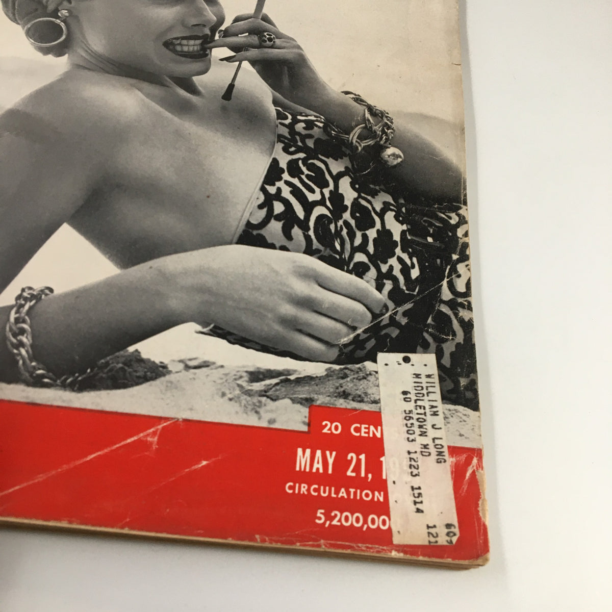Close-up view of the cover of VTG Life Magazine May 21 1951, highlighting details including the magazine title, date, and a vintage beach fashion model with a cigarette and striking jewelry.