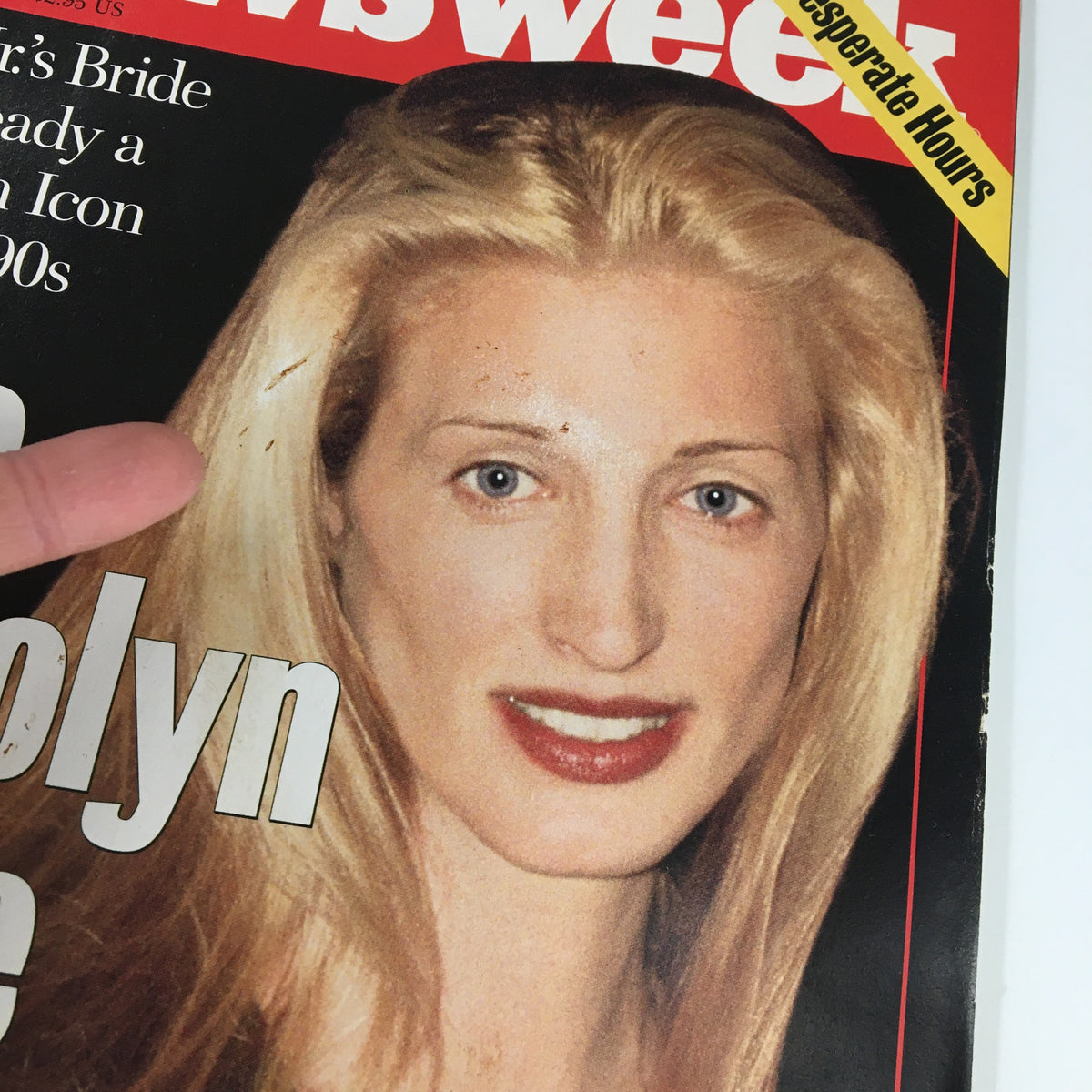 Cover of Newsweek Magazine from October 21, 1996 featuring Carolyn, the fashion icon of the '90s, with a close-up of her face and long blonde hair.