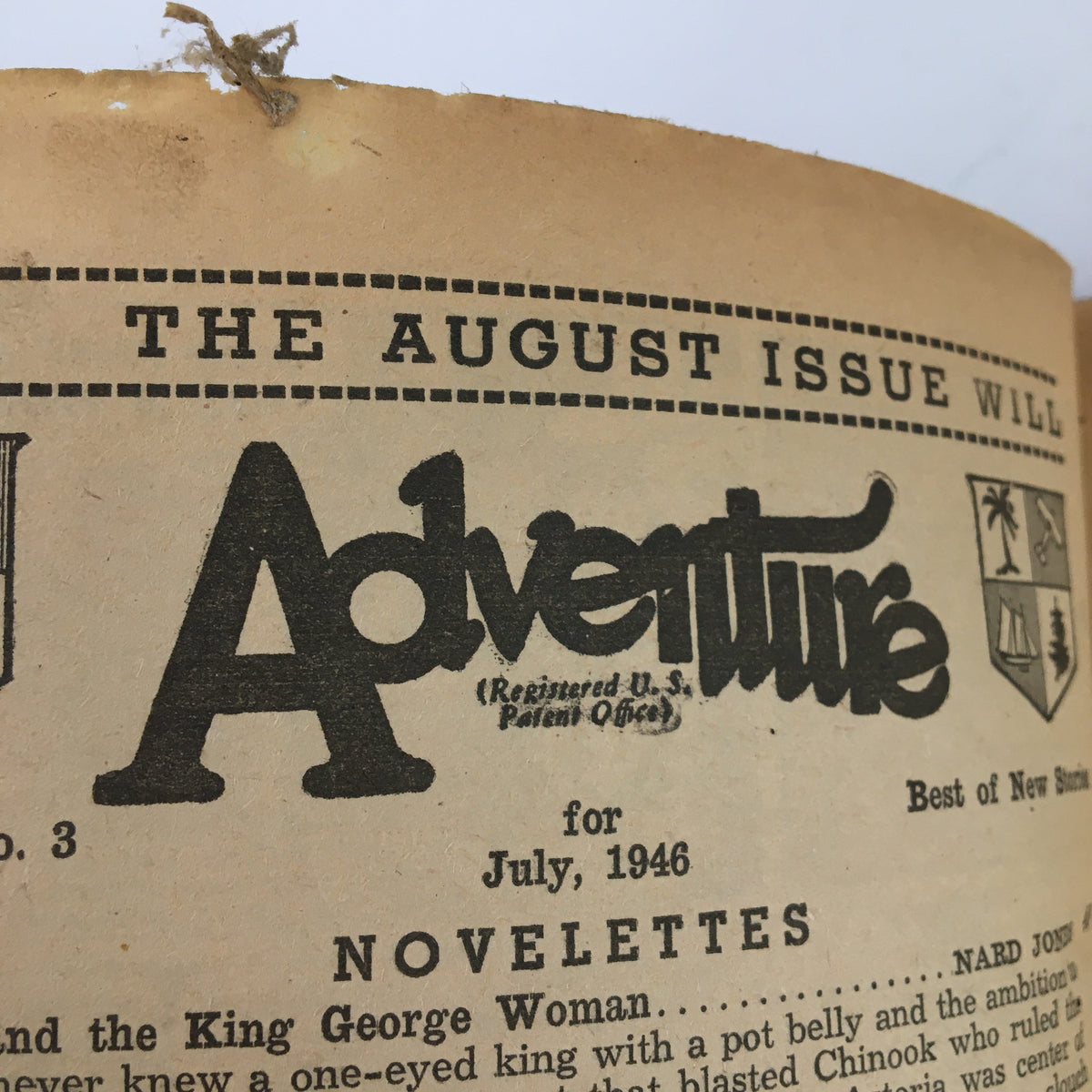 Zoomed-in view of the title and date on the inside page of VTG Adventure Magazine July 1946, showcasing the vintage publication's design.
