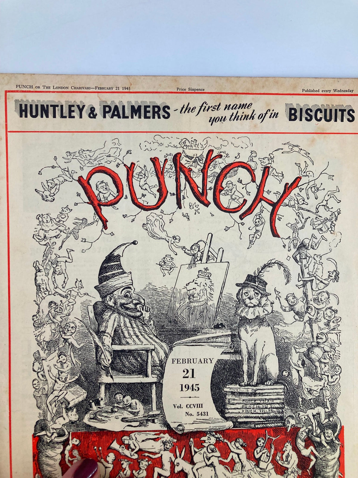 Detailed view of the cover of VTG Punch Magazine February 21 1945, showcasing vibrant artwork with playful characters and the publication data prominently displayed.