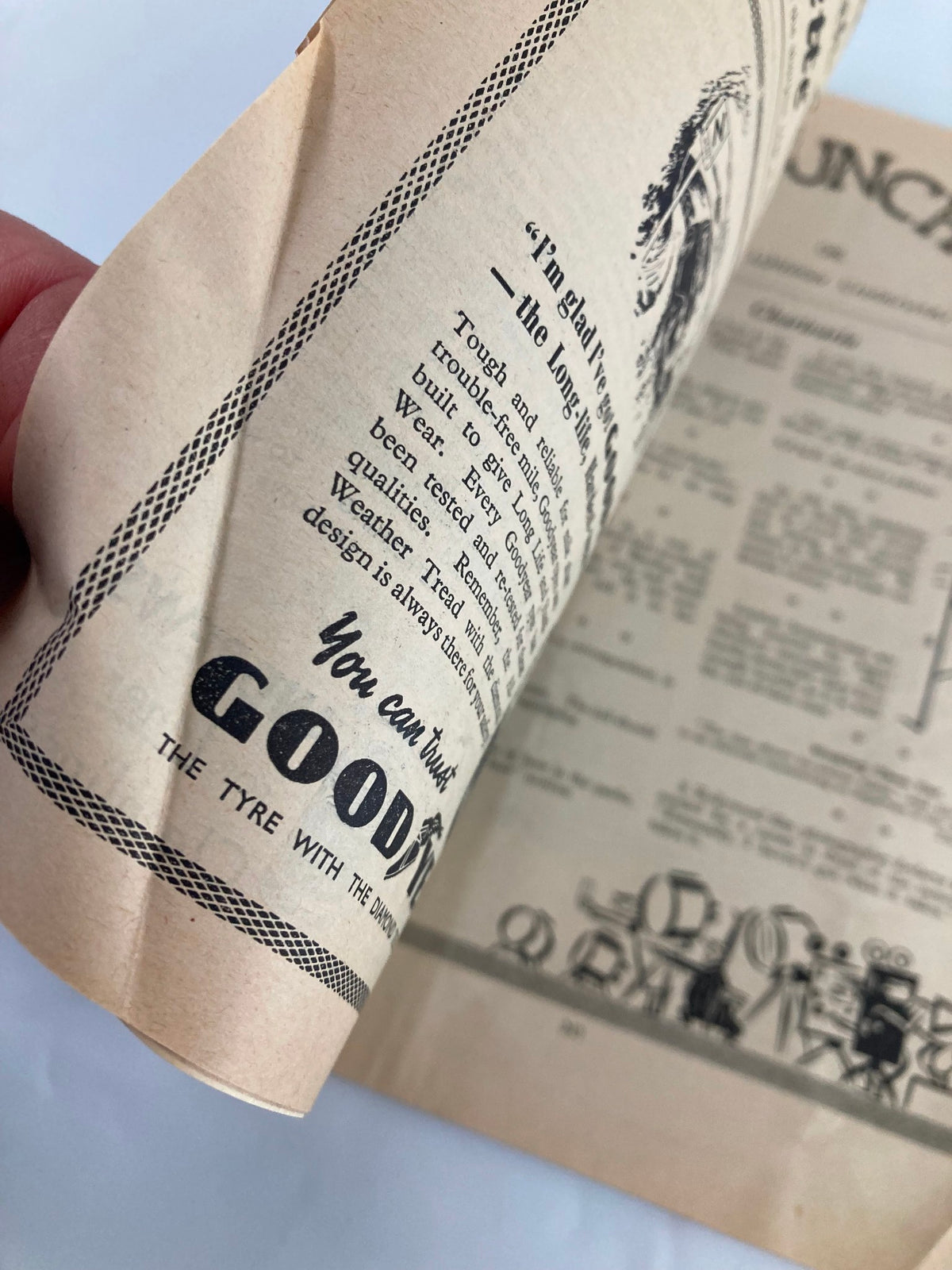 Close-up view of the VTG Punch Magazine March 24 1948 showcasing vintage advertising with humorous text and illustrations, reflecting the post-World War II era.