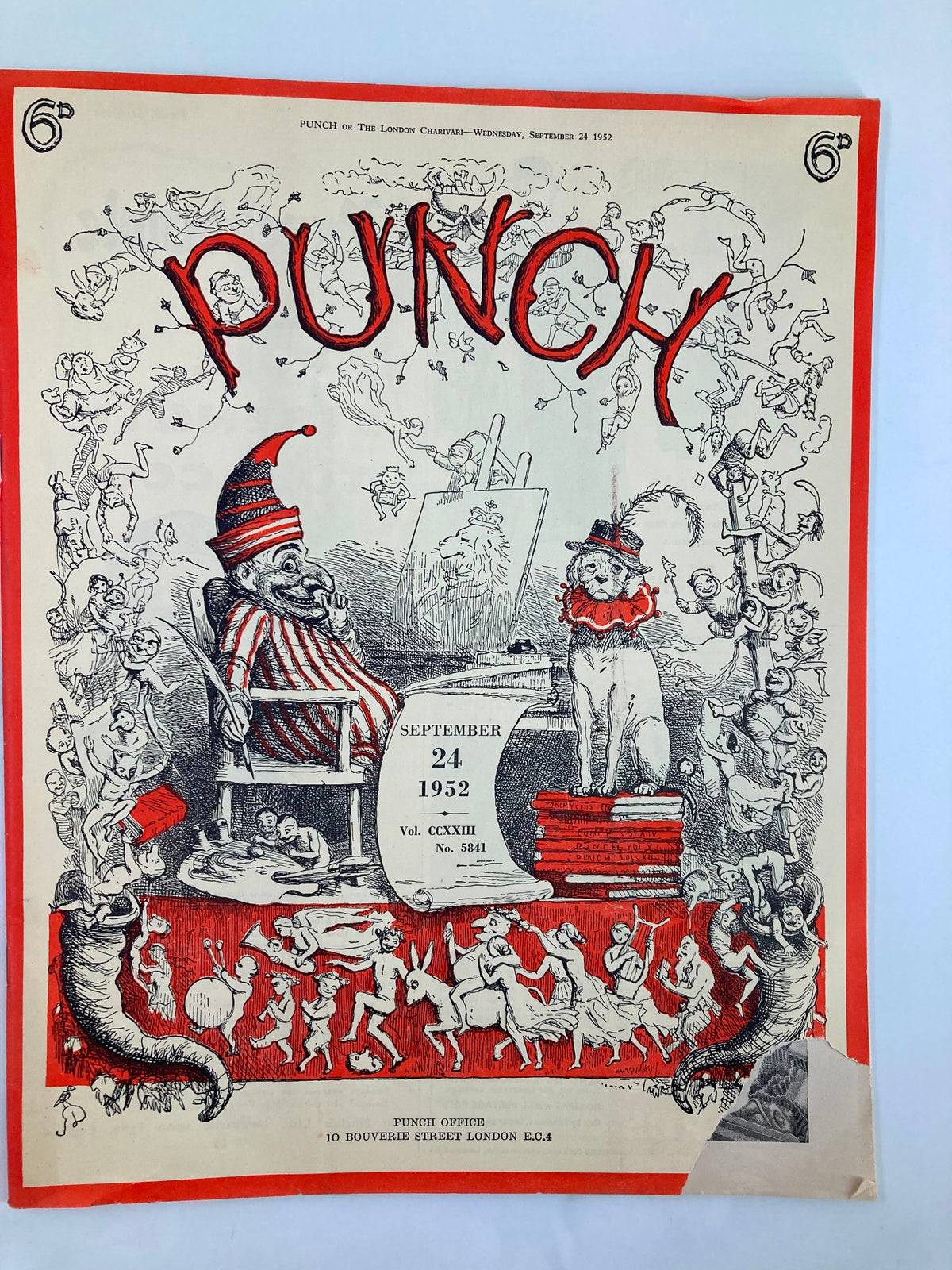 Cover of VTG Punch Magazine from September 24, 1952, featuring colorful illustrations, humorous characters, and the title 'PUNCH' prominently displayed. This vintage magazine is part of Volume 223, Issue #5841, highlighting WWII cartoons and satire.