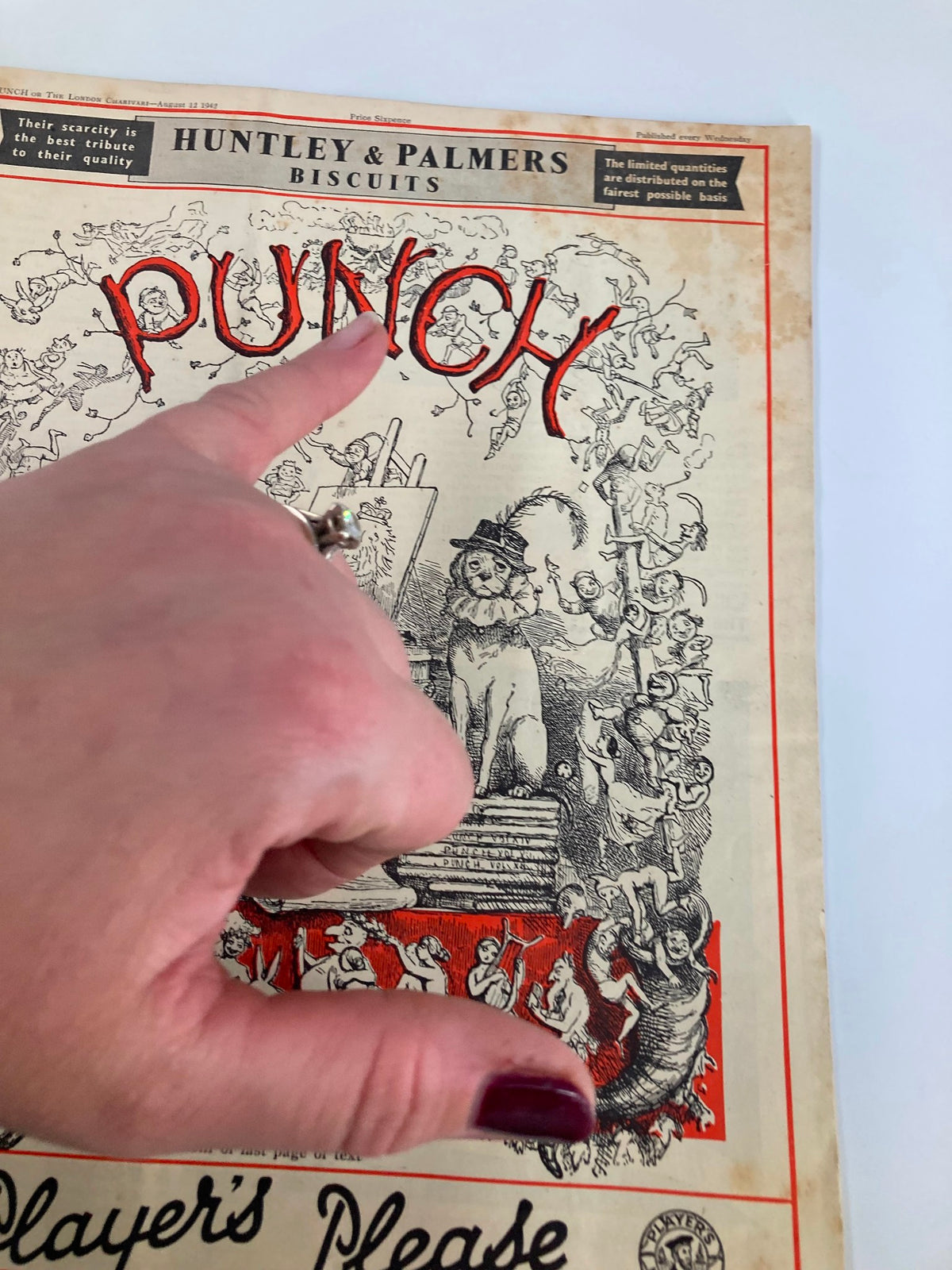 Detail view of VTG Punch Magazine August 12 1942, issue #5294, highlighting the title 'PUNCH' and playful cartoon graphics.