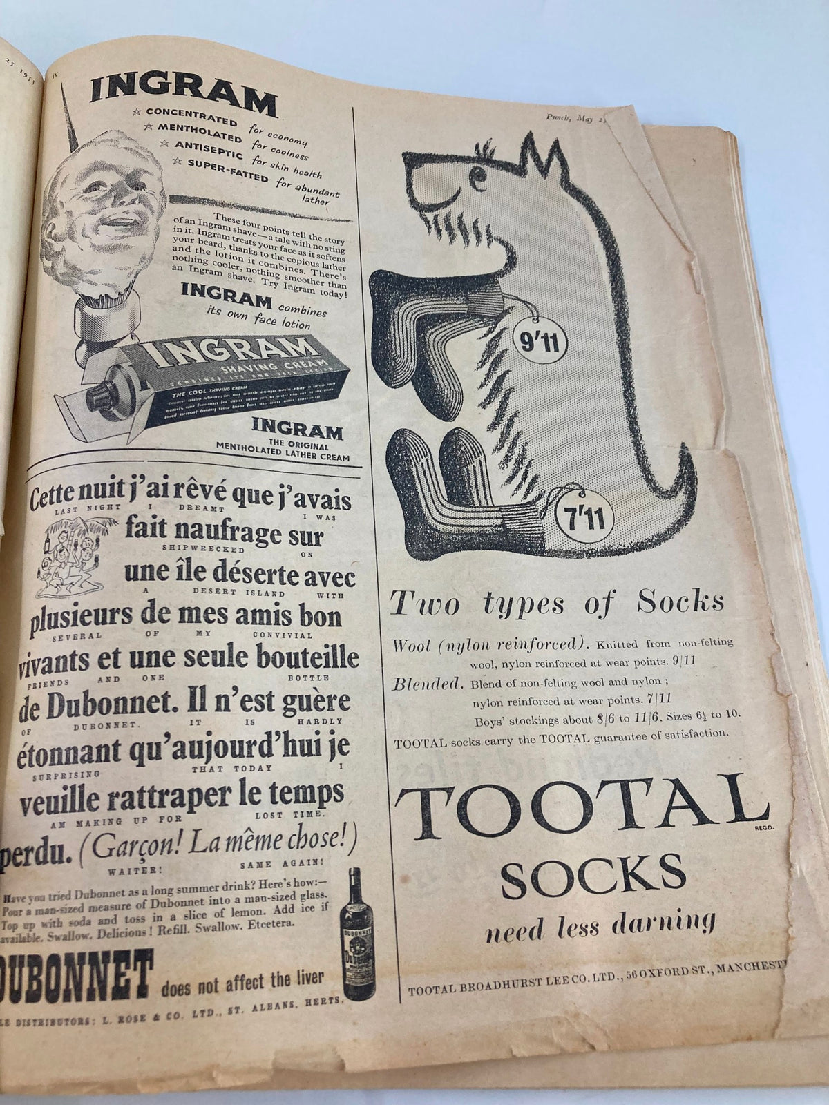 Interior page of VTG Punch Magazine May 25 1955 Summer Number displaying vintage advertisements including Ingram shaving cream and Tootal socks, highlighting the advertising style of the 1950s.