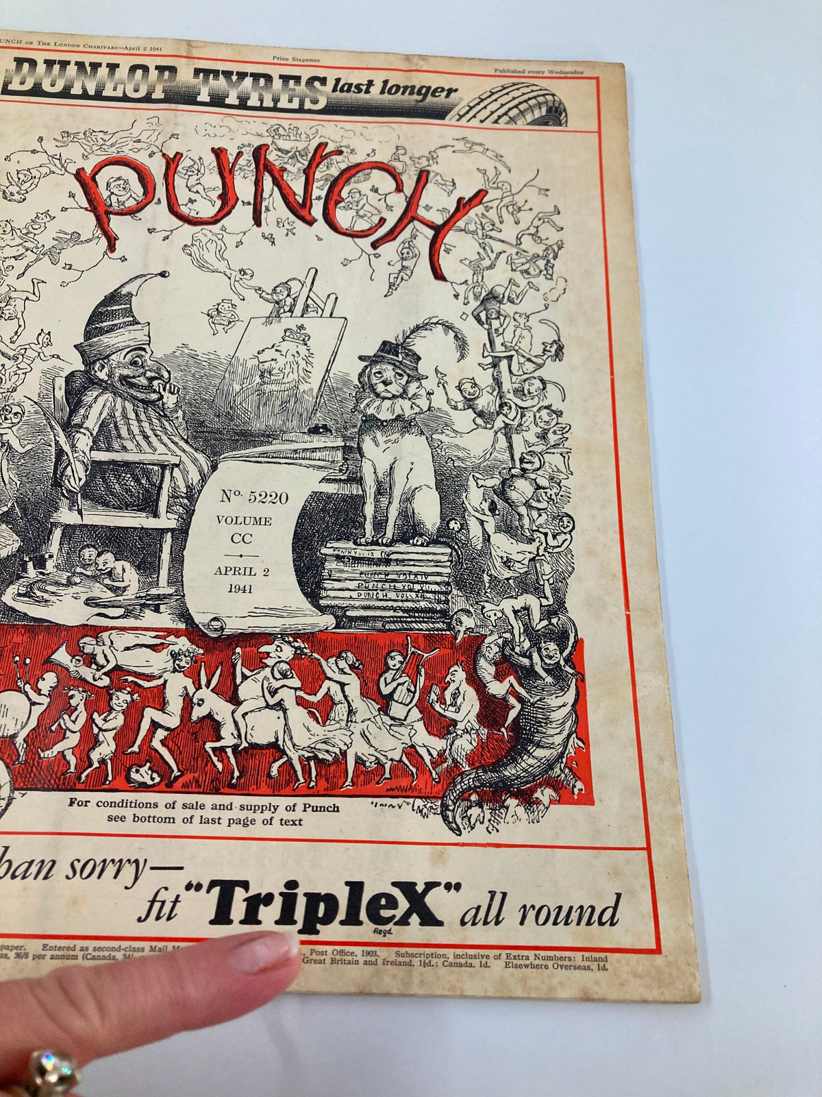 Close-up view of the cover of VTG Punch Magazine April 2, 1941, issue #5220, highlighting vintage art and humorous text from the World War II era.