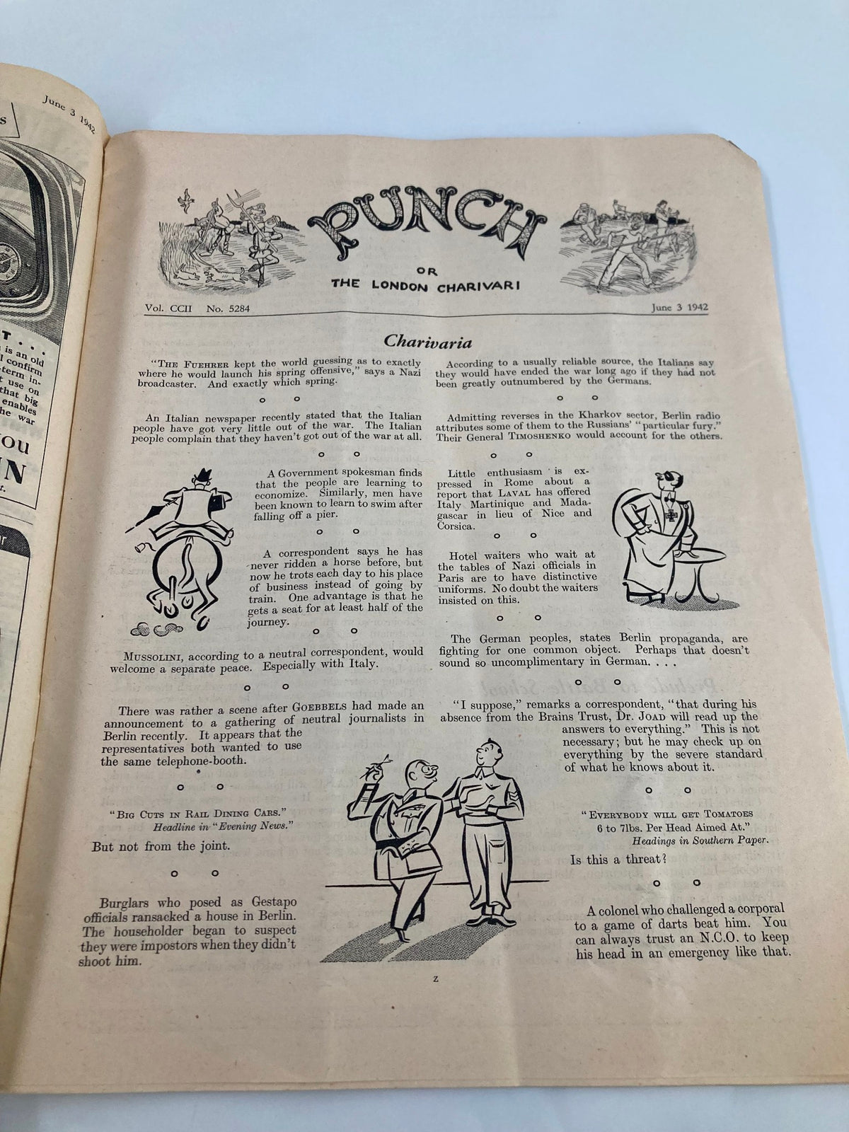 Inside page of VTG Punch Magazine June 3 1942 #5284 Vol 202 showcasing witty satire and cartoons related to World War II.