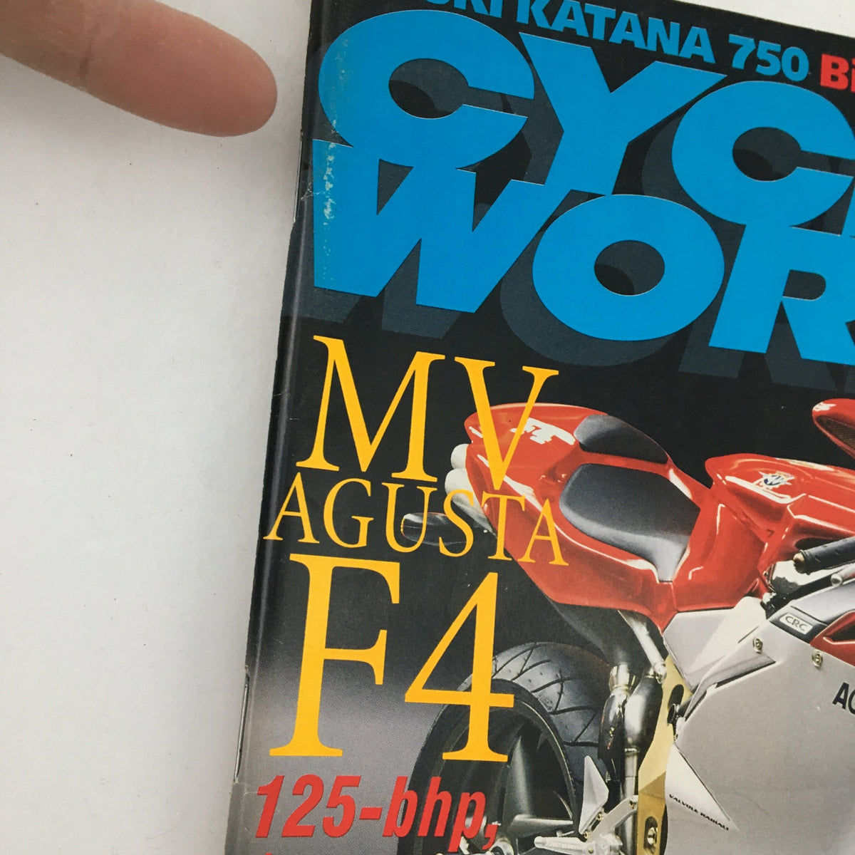 Close-up view of the Cycle World Magazine June 1998 cover showcasing the MV Agusta F4 with a focus on the title and specifications of the motorcycle.