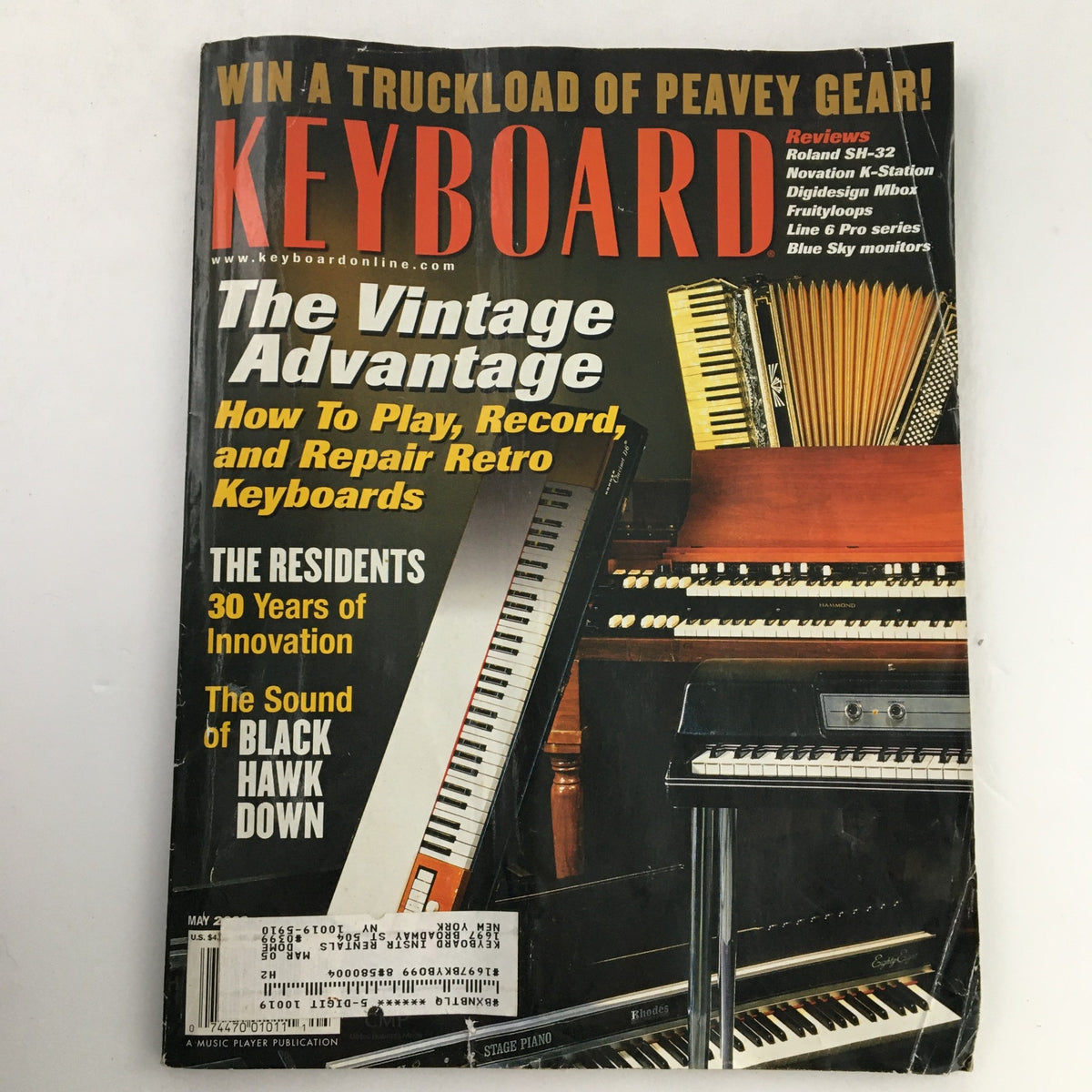 Cover of Keyboard Magazine May 2002 featuring reviews of Roland SH-32, Fruityloops, and insights on Black Hawk Down soundtrack.