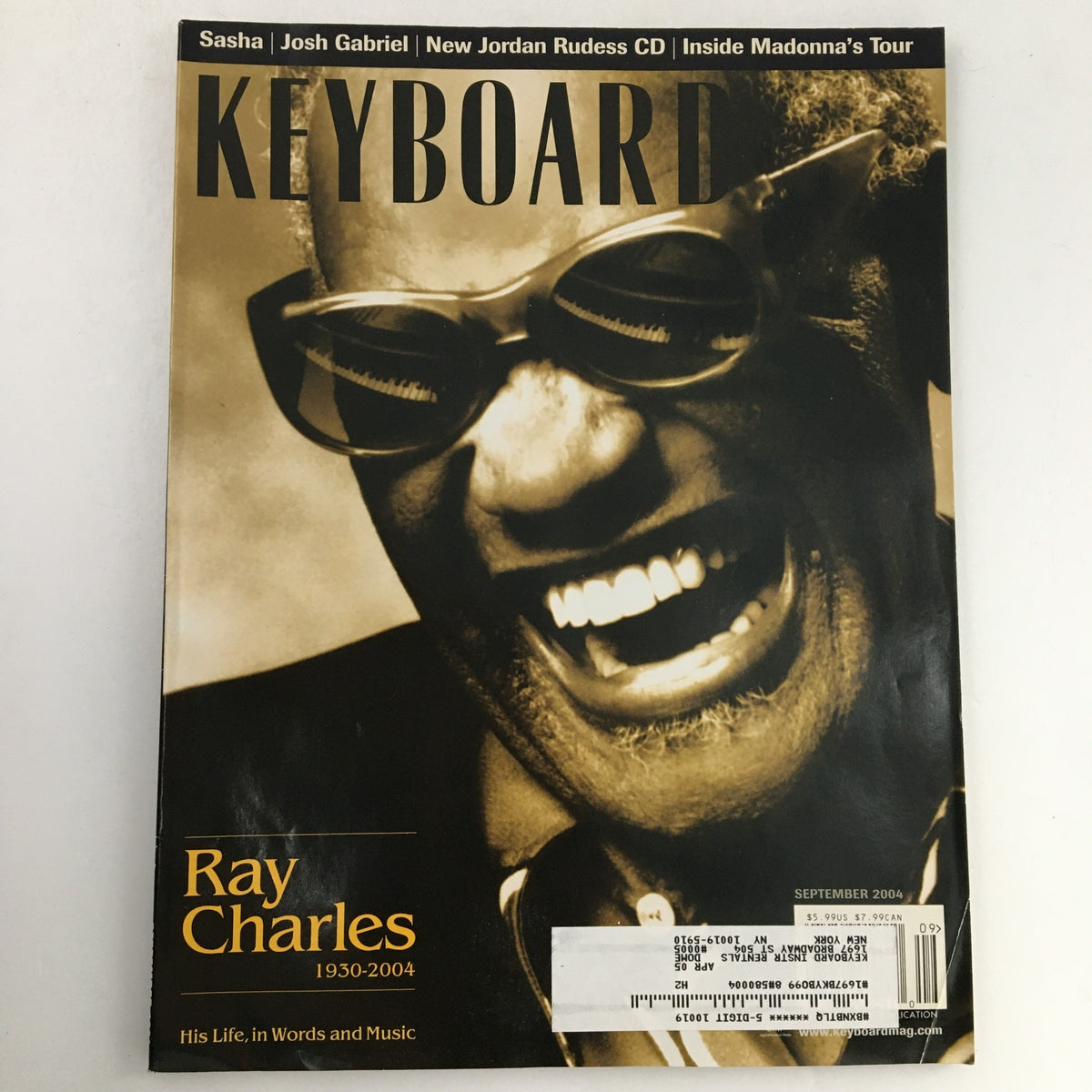 Keyboard Magazine September 2004 featuring a tribute to Ray Charles, highlighting his life from 1930 to 2004 with a vibrant image of him smiling, showcasing his iconic legacy in music.