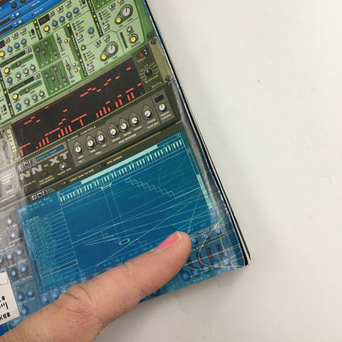 Close-up detail of Keyboard Magazine June 2002 showcasing music production software with a finger pointing at the interface, emphasizing Cubase SX features.