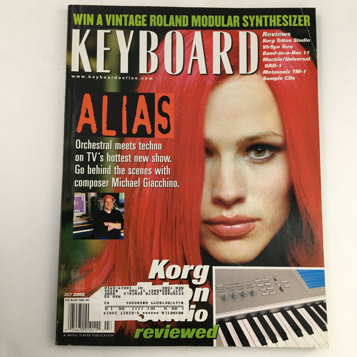 Keyboard Magazine July 2002 featuring Jennifer Garner on the cover with red hair and composer Michael Giacchino, showcasing a vibrant design and offering insights into music and film culture.