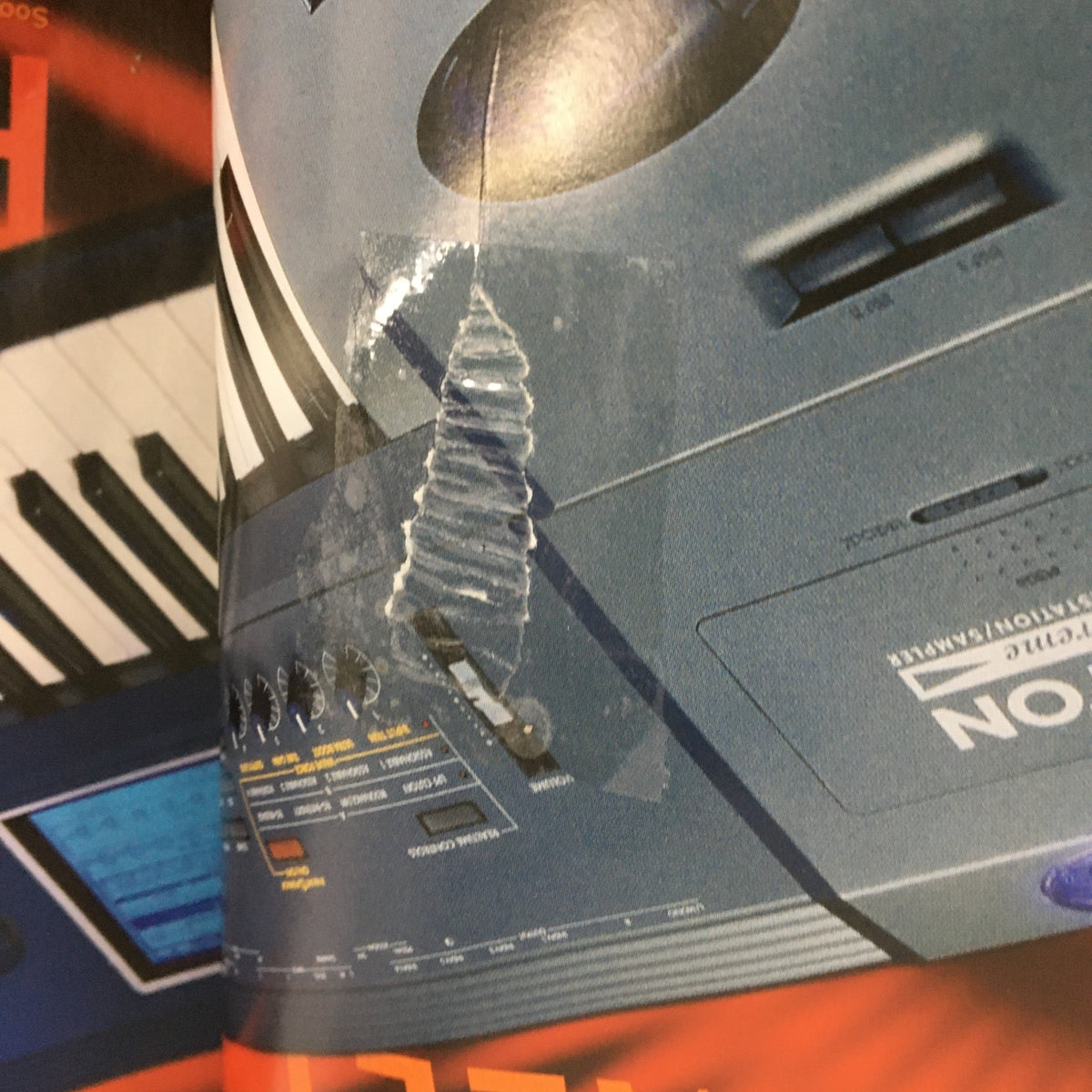Close-up of a keyboard instrument featured in Keyboard Magazine August 2004, showcasing the detailed design and technology related to music production.