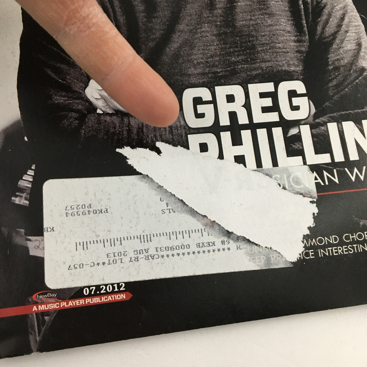 Close-up of Keyboard Magazine July 2012 cover showing Greg Phillinganes with an address label on the front, highlighting the publication's vintage appeal.