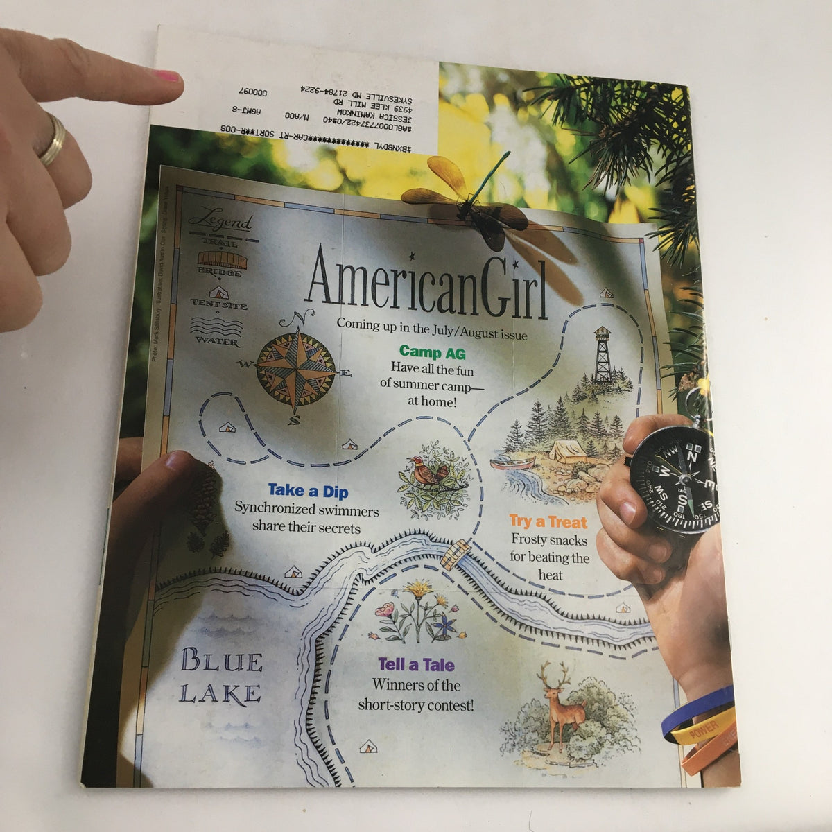 Back cover of American Girl Magazine May-June 1999 displaying a map and teaser for upcoming issues, with a focus on summer camp themes.
